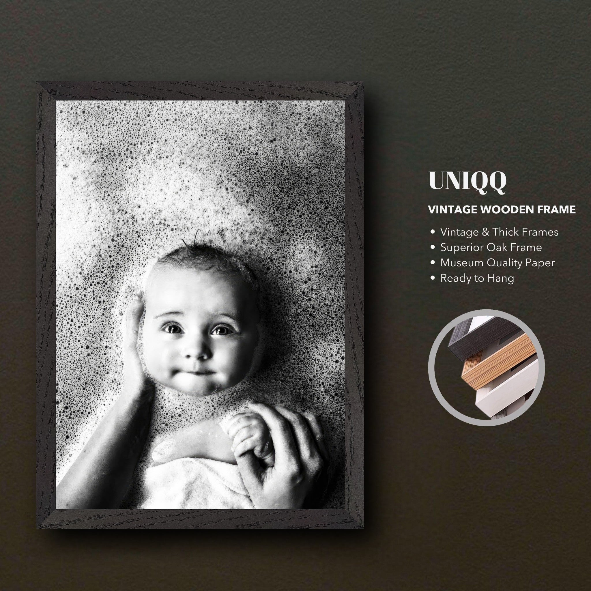 Vintage framed print of a serene baby surrounded by bubbles in black and white photography.