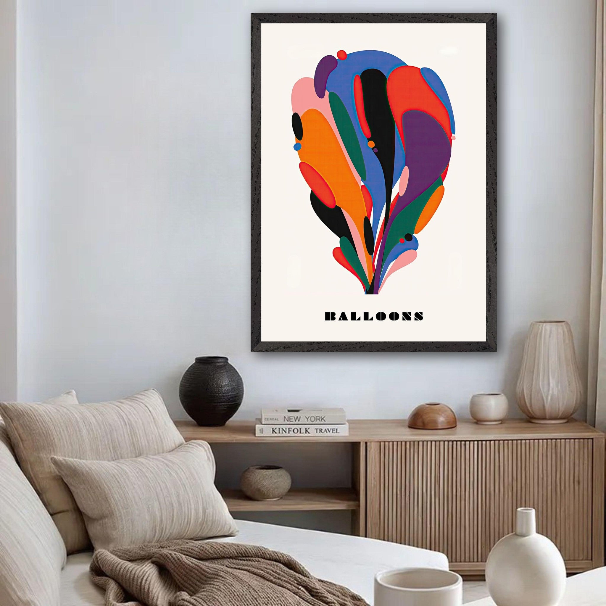 Vibrant abstract balloon art print in a stylish living room, showcasing bold colors and modern design elements.