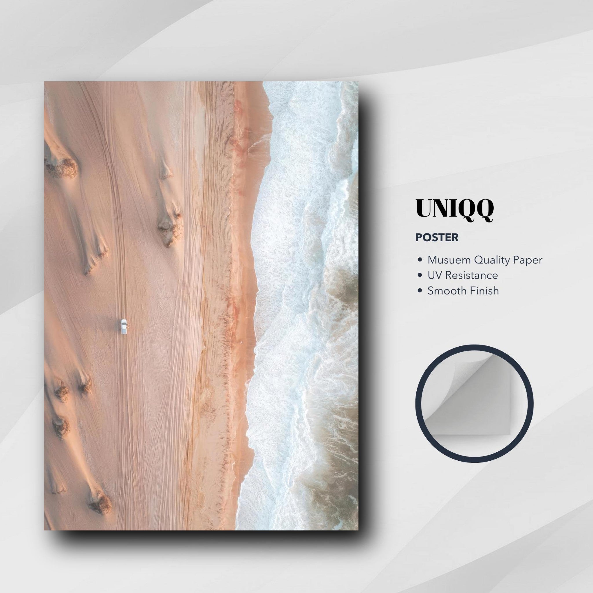 Drone photography poster showcasing desert dunes meeting ocean waves, printed on museum quality paper.