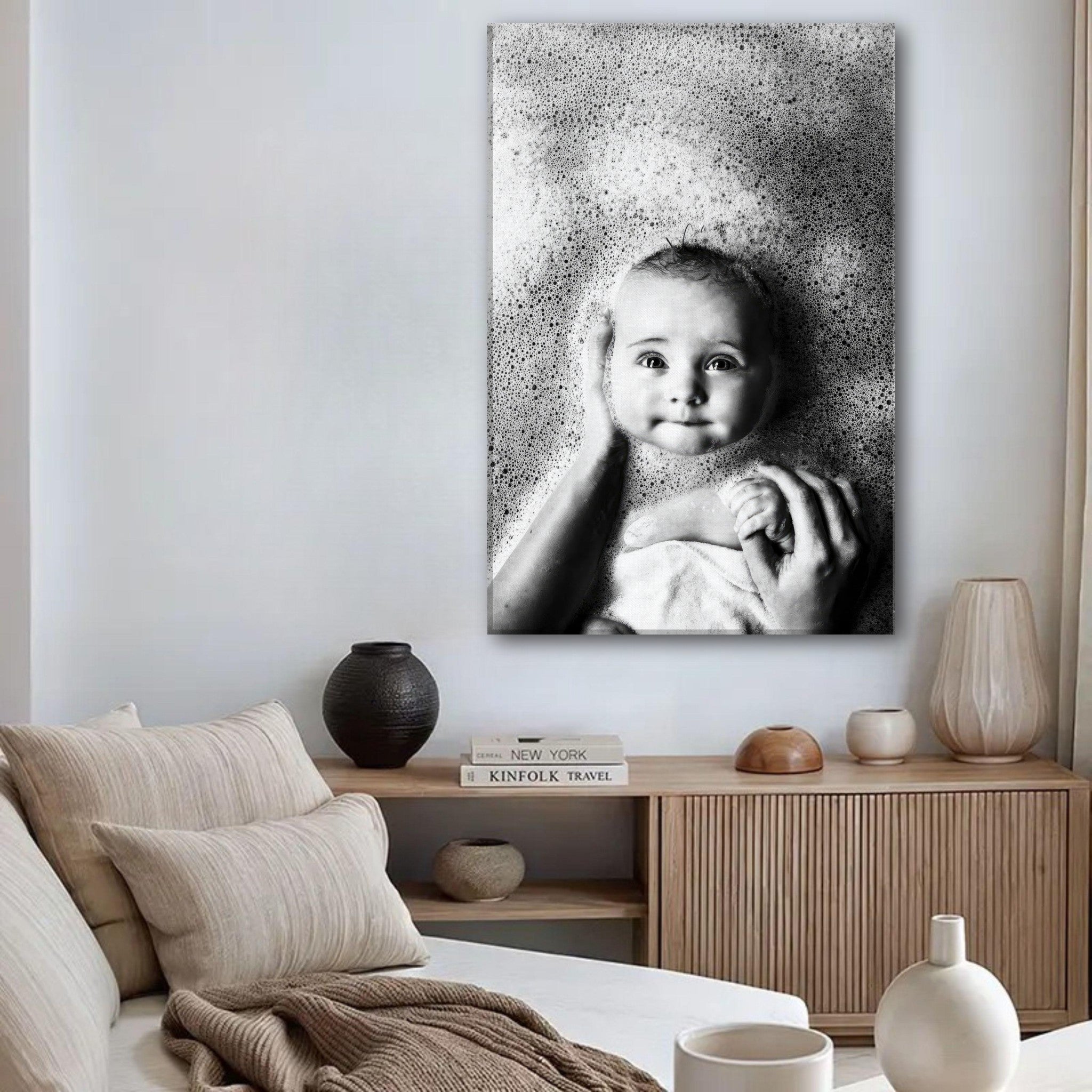 Black-and-white baby bath photography canvas print showcasing a joyful baby surrounded by bubbles.