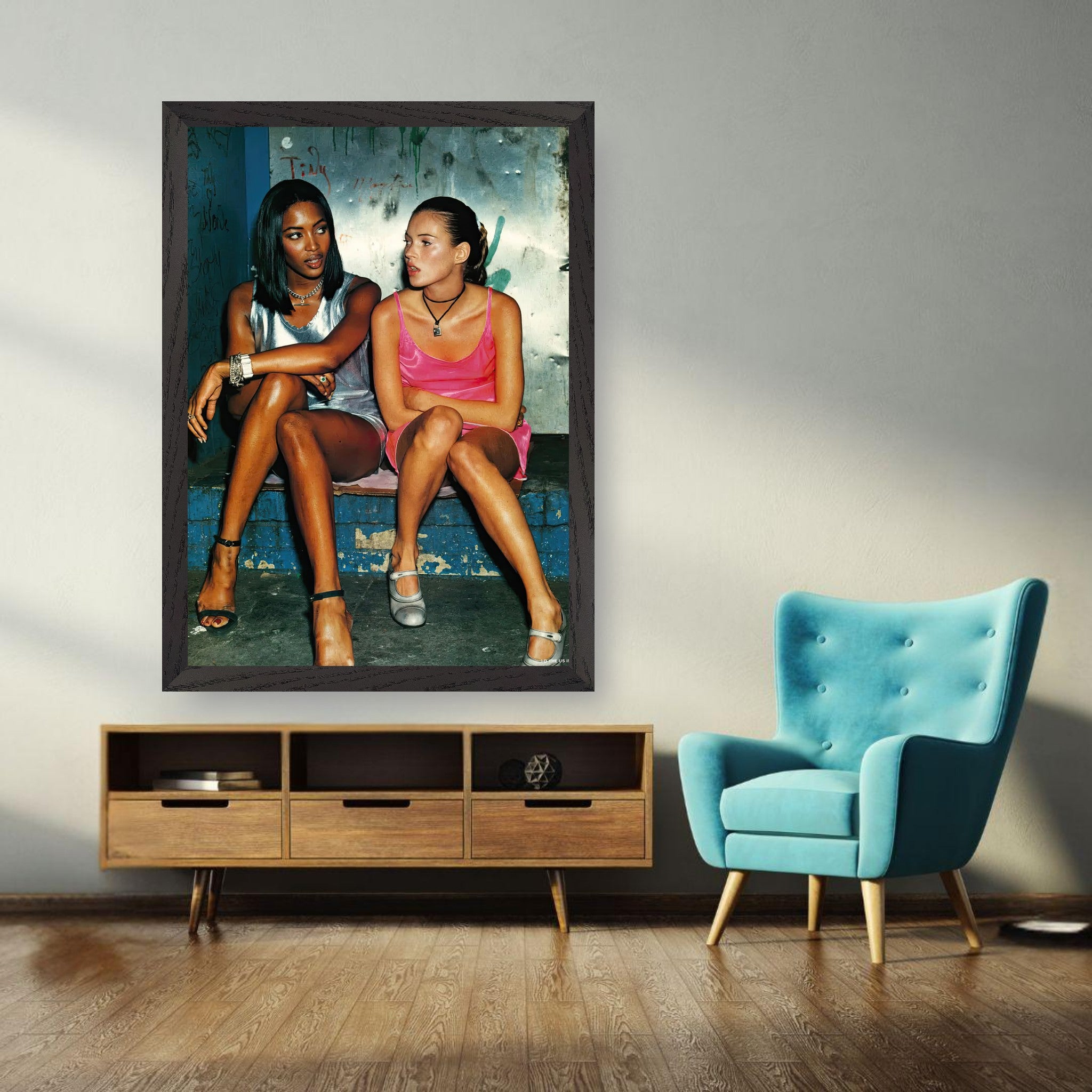 Naomi Campbell and Kate Moss vintage framed print showcasing 90s supermodel glamour in a stylish living room setting.