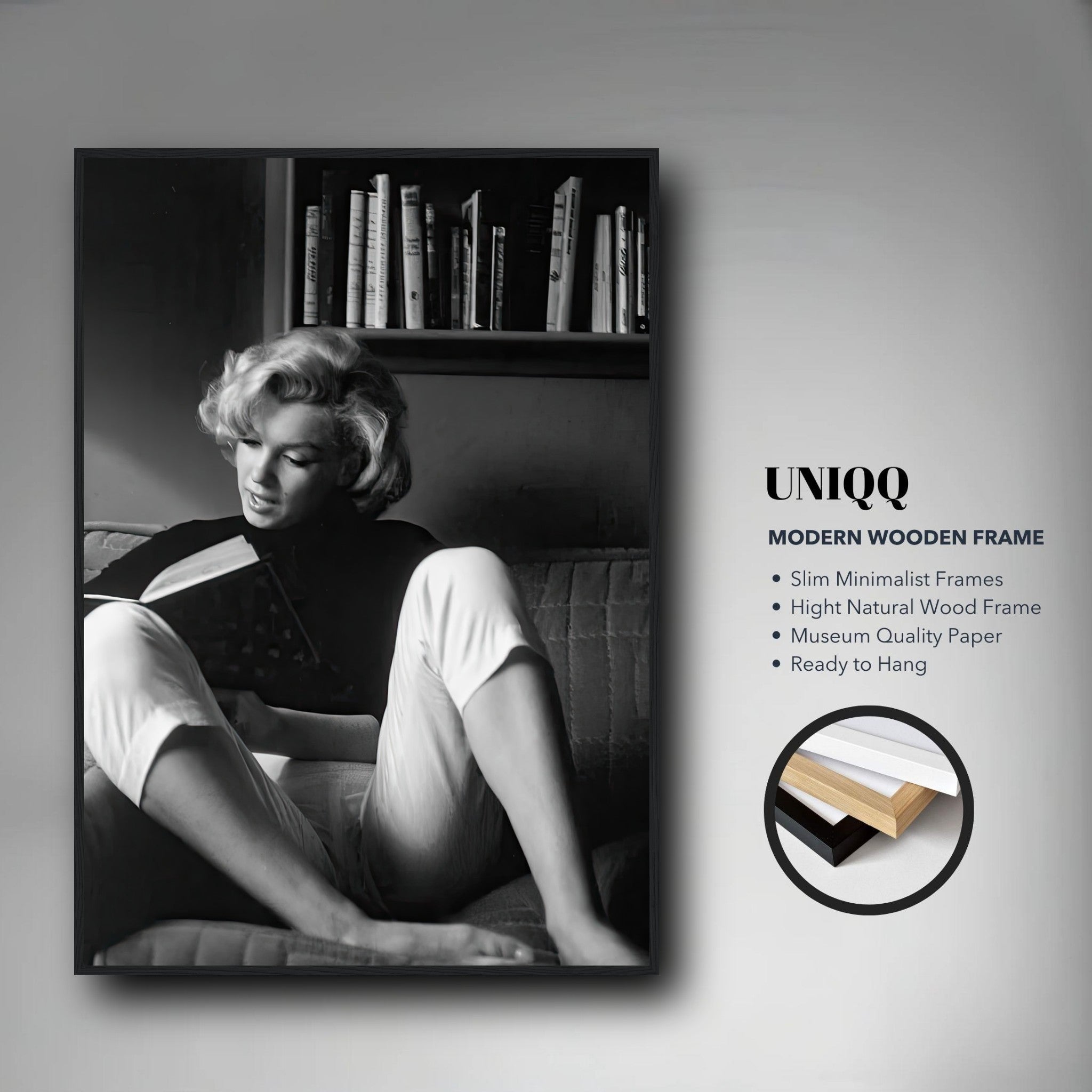 Framed print of Marilyn Monroe reading at home, showcasing classic Hollywood elegance in black-and-white.