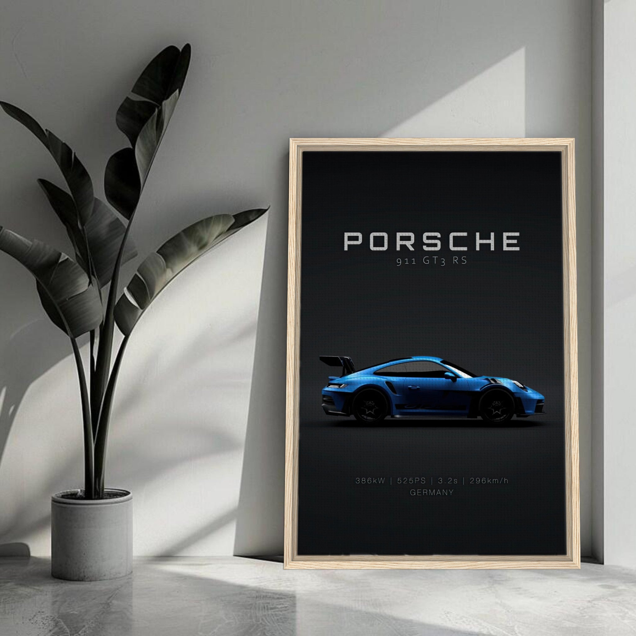 Porsche 911 GT3 RS framed canvas print showcasing blue car on minimalist black background.