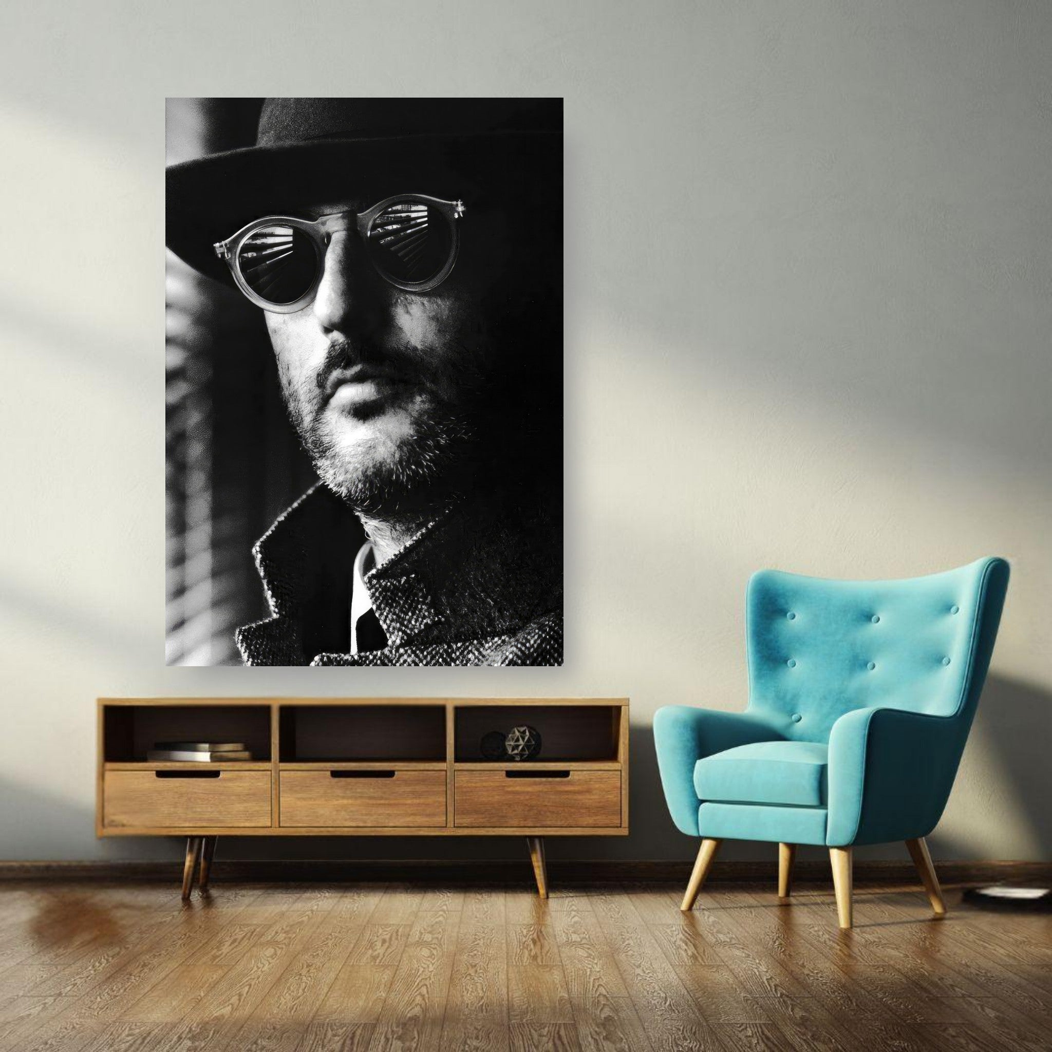 Jean Reno Leon photography poster displayed in modern living room with a teal chair.