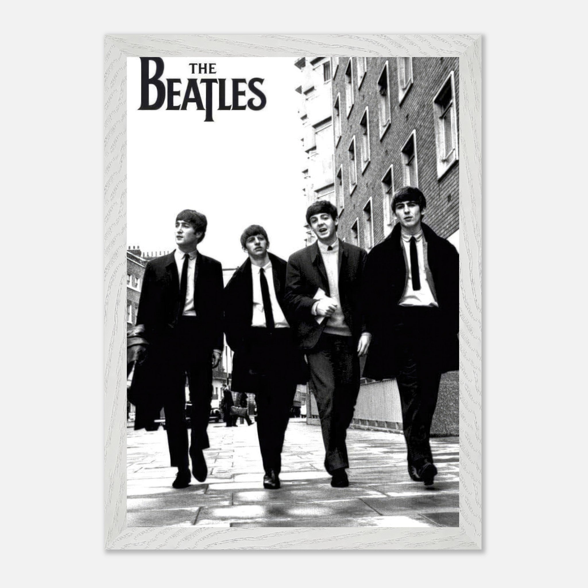 The Beatles cover vintage framed print featuring iconic black and white image of the band walking together.