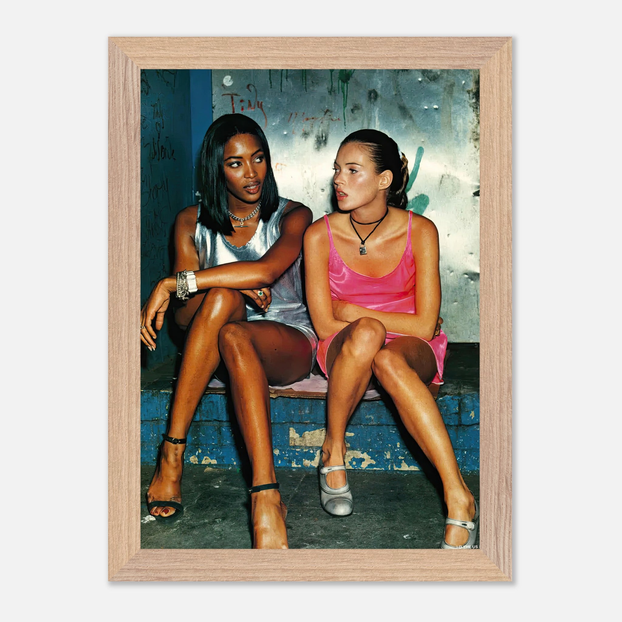 Naomi Campbell and Kate Moss vintage framed print showcasing 90s supermodel style and glamour.