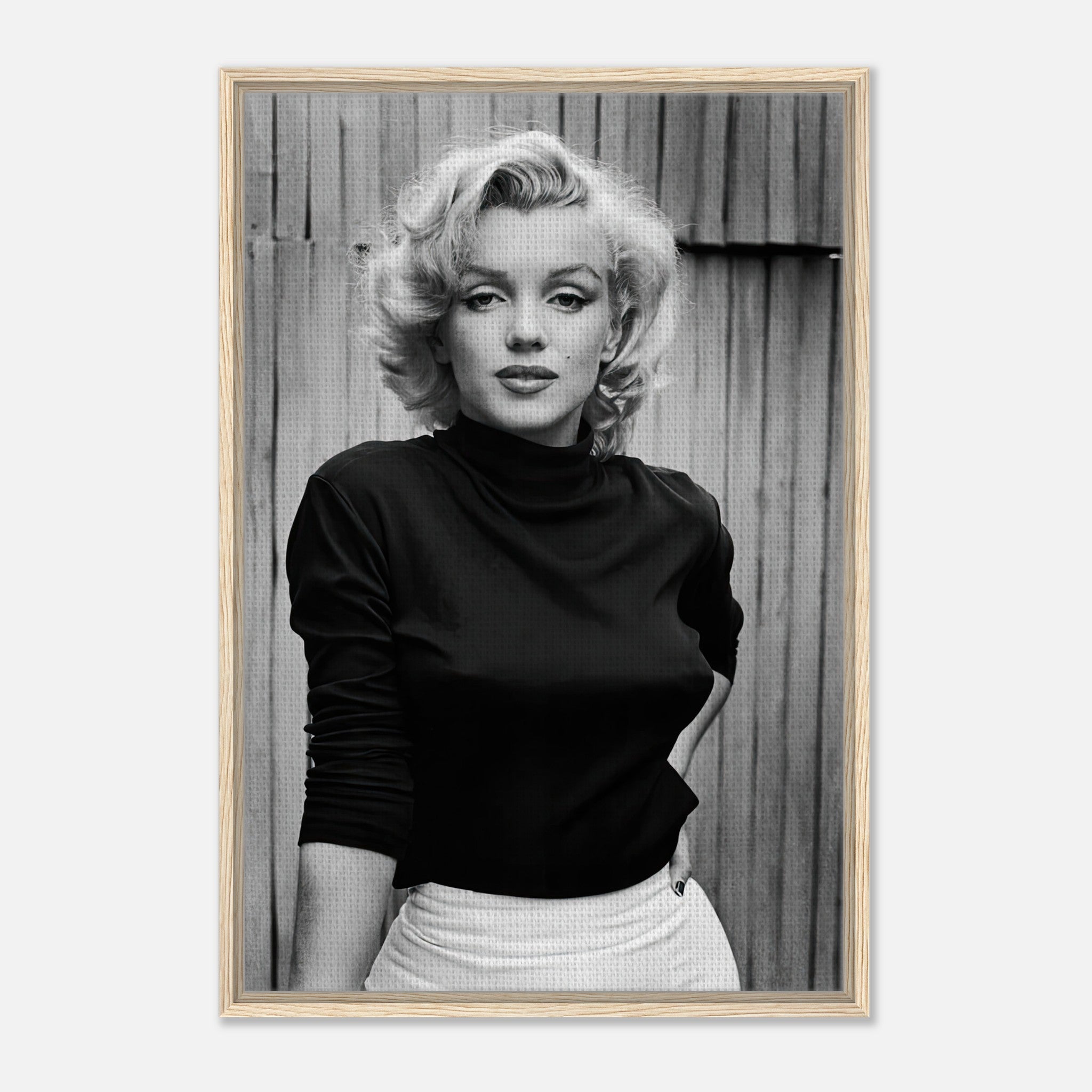 Framed black-and-white portrait of Marilyn Monroe, showcasing her iconic beauty and timeless elegance.