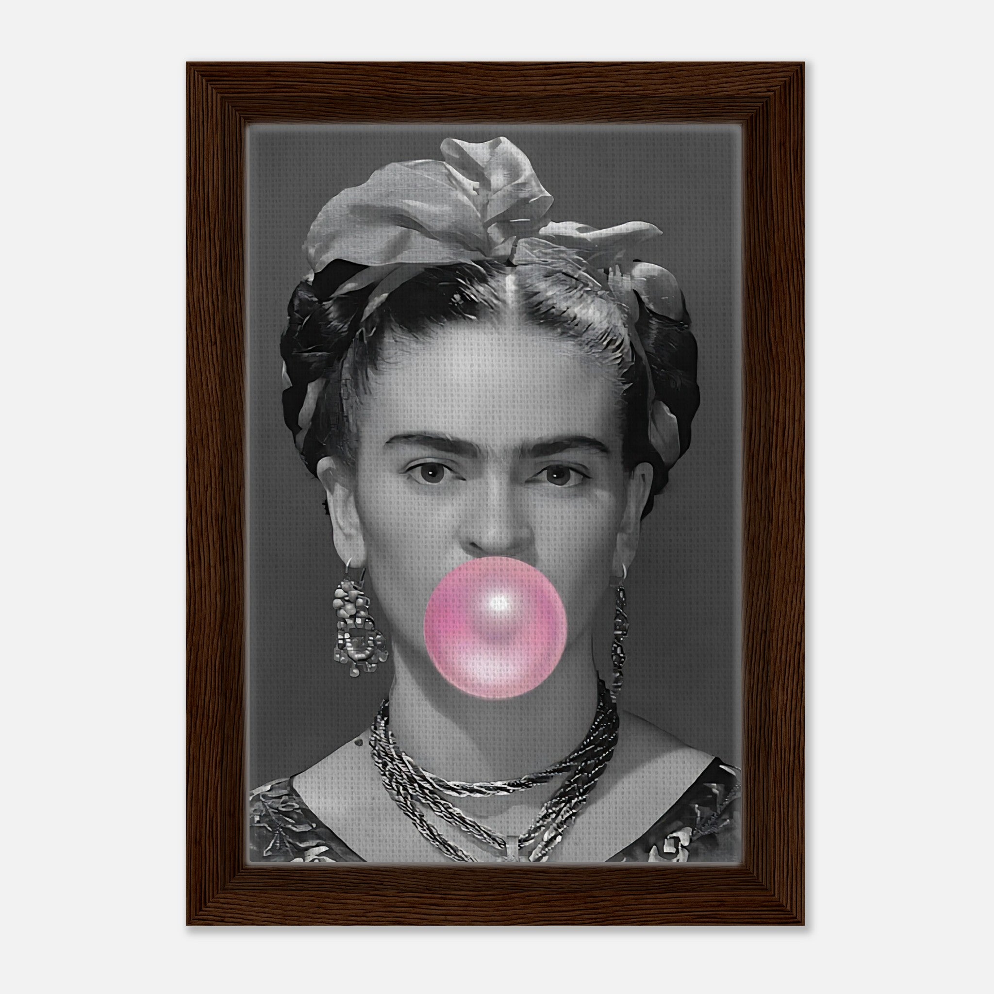 Frida Kahlo bubble gum framed canvas print in grayscale with pink bubble, featuring a natural Wood frame.