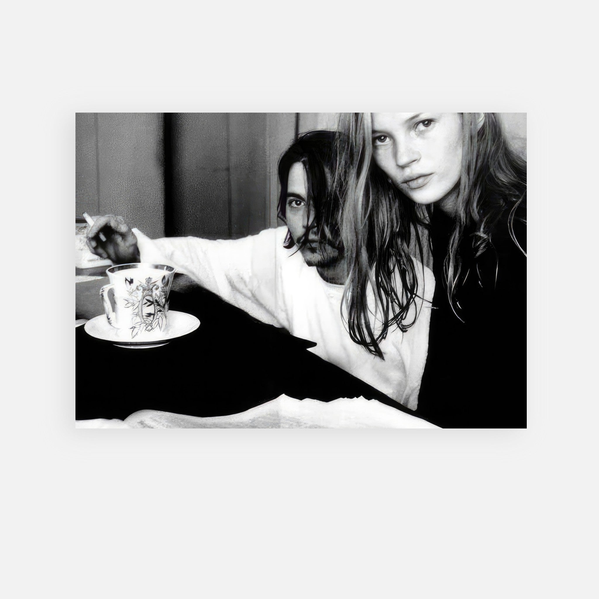Johnny Depp and Kate Moss in 1994, a black-and-white metal print capturing '90s romance and style.