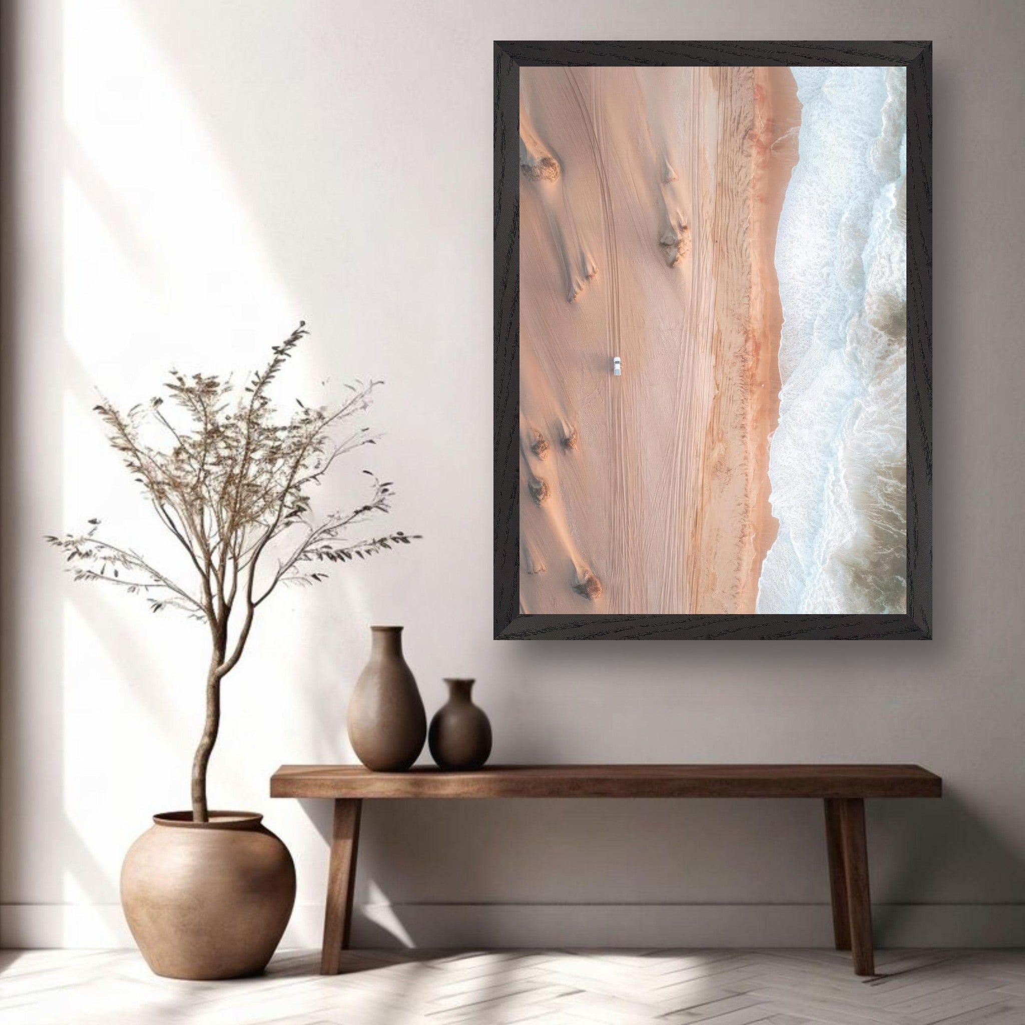 Vintage framed print of drone photography showing the desert meeting ocean, highlighting contrasting colors and textures.