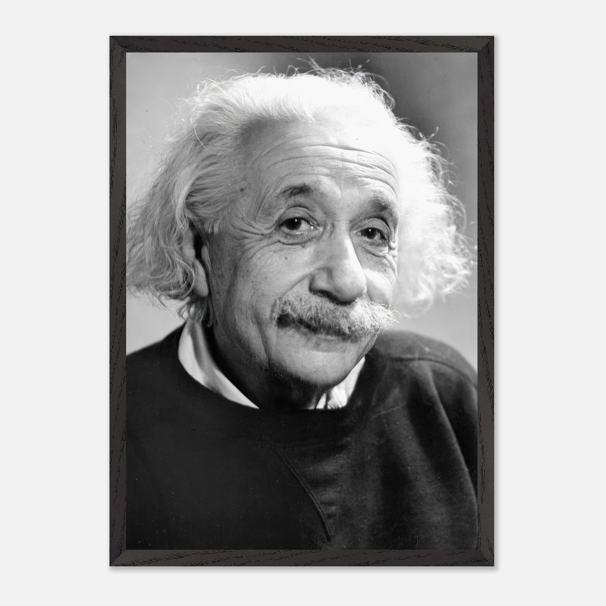 Black-and-white portrait of Albert Einstein from 1946, showcasing his expressive eyes and signature hair.