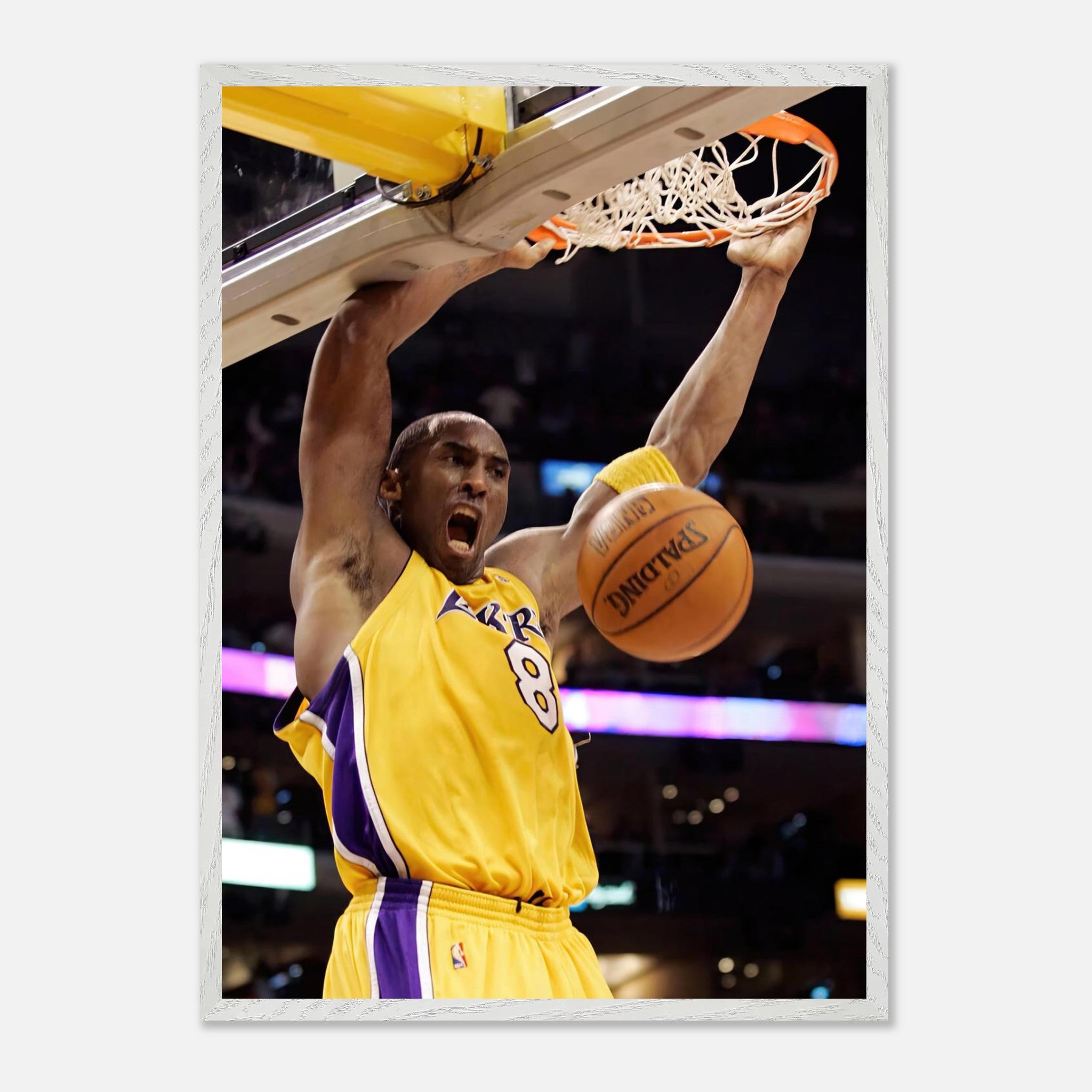 Kobe Bryant's iconic slam dunk framed print showcasing his athleticism and passion for basketball.