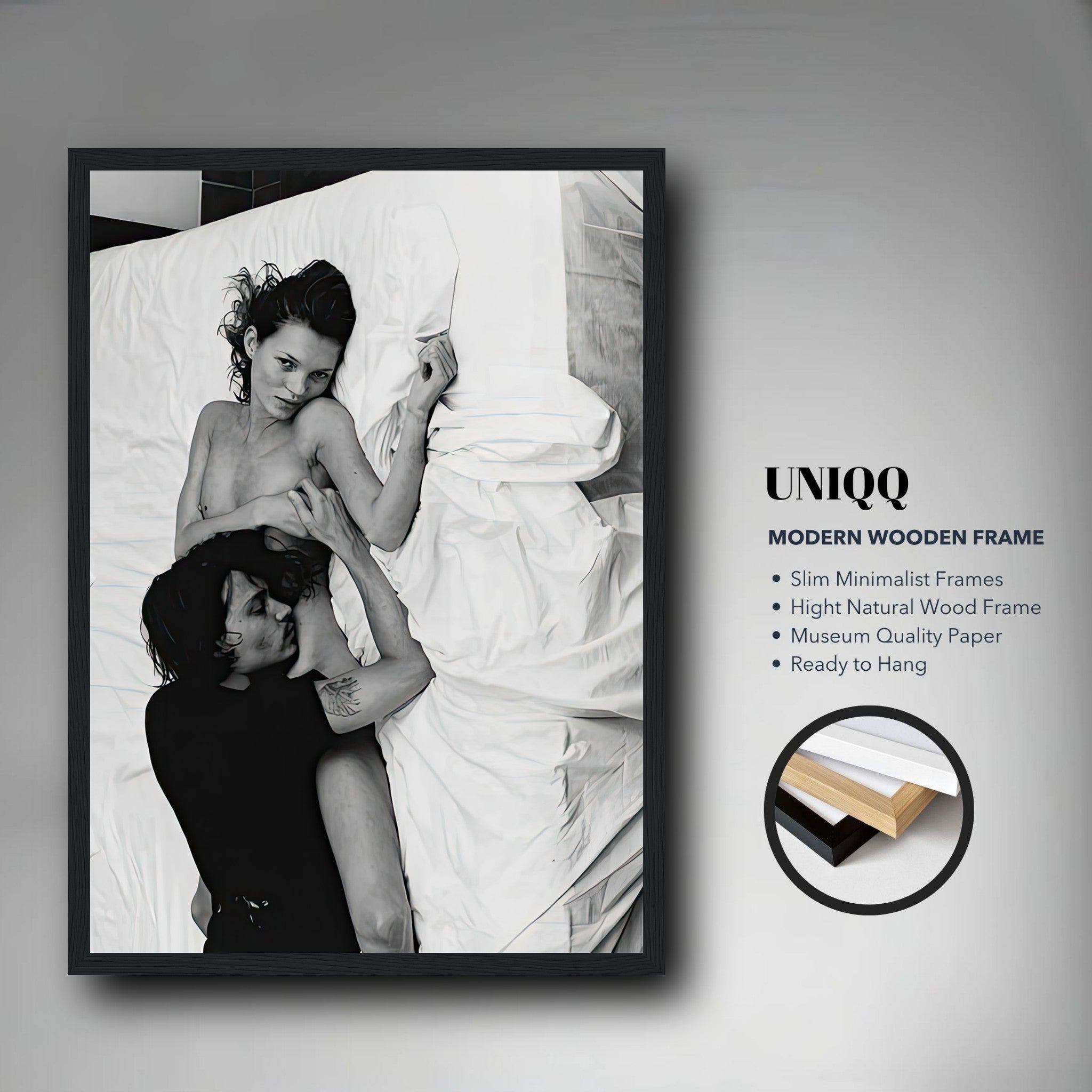 Framed print of Kate Moss and Johnny Depp in bed, black-and-white photo showcasing glamour and chemistry.