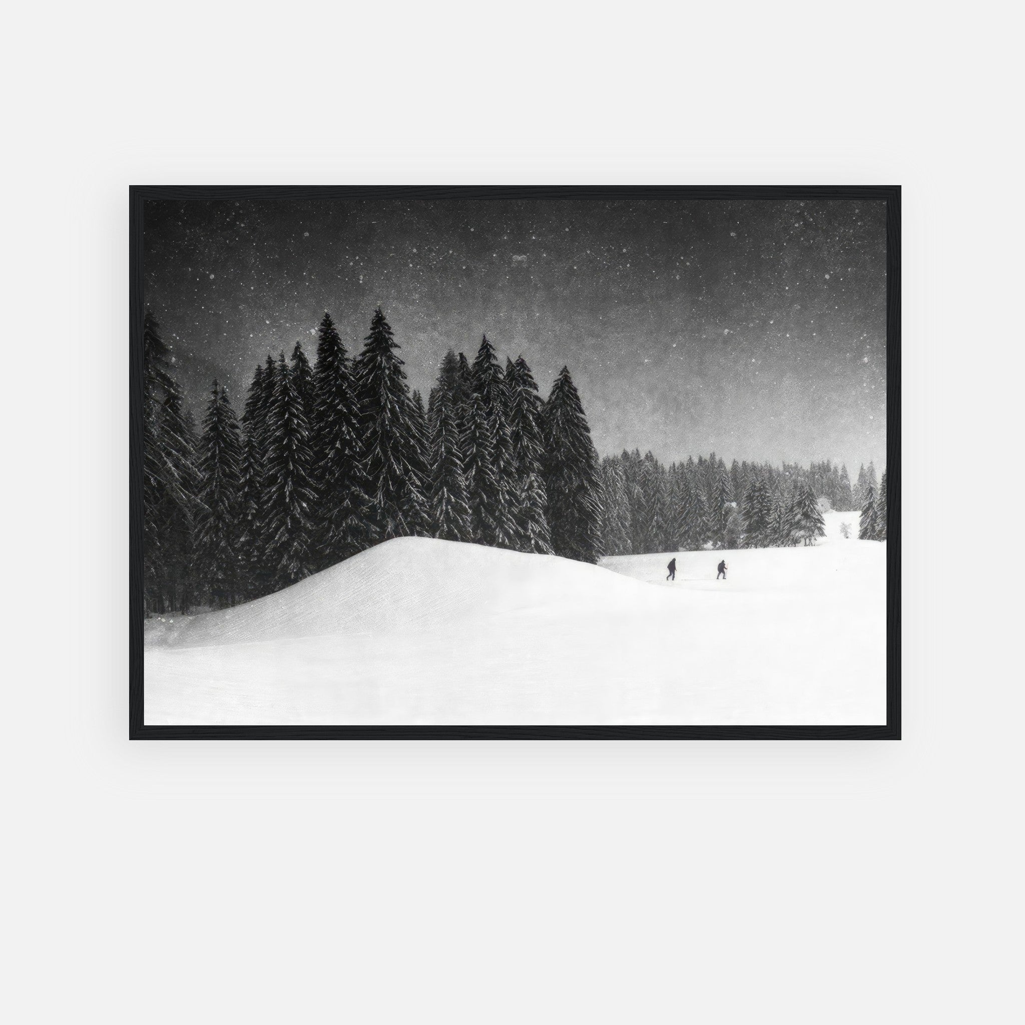 Winter Crossing framed print showcasing a serene black-and-white snow-covered forest scene.