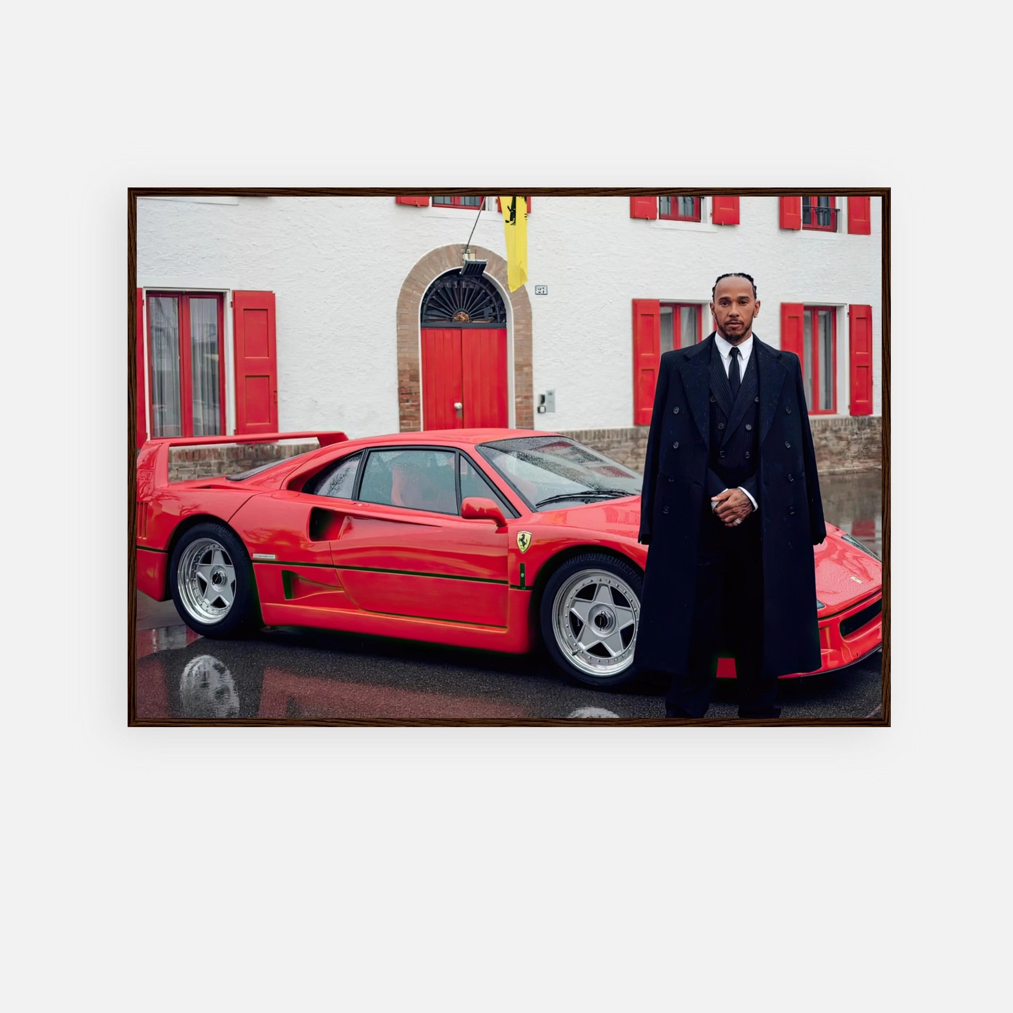 Lewis Hamilton in front of a Ferrari F40, captured in a stylish framed print celebrating speed and sophistication.