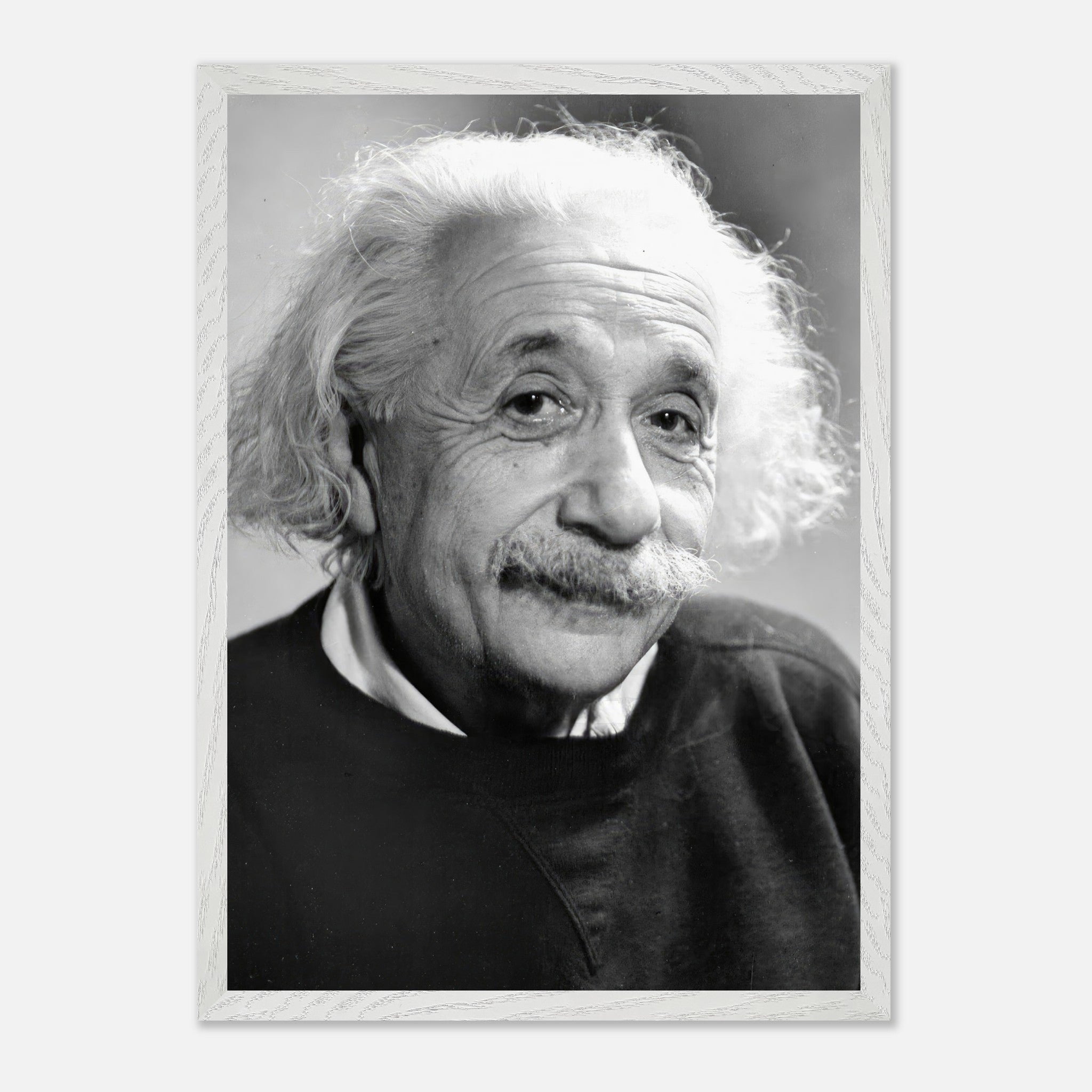 Black-and-white portrait of Albert Einstein (1946), showcasing his wisdom and iconic unruly hair.