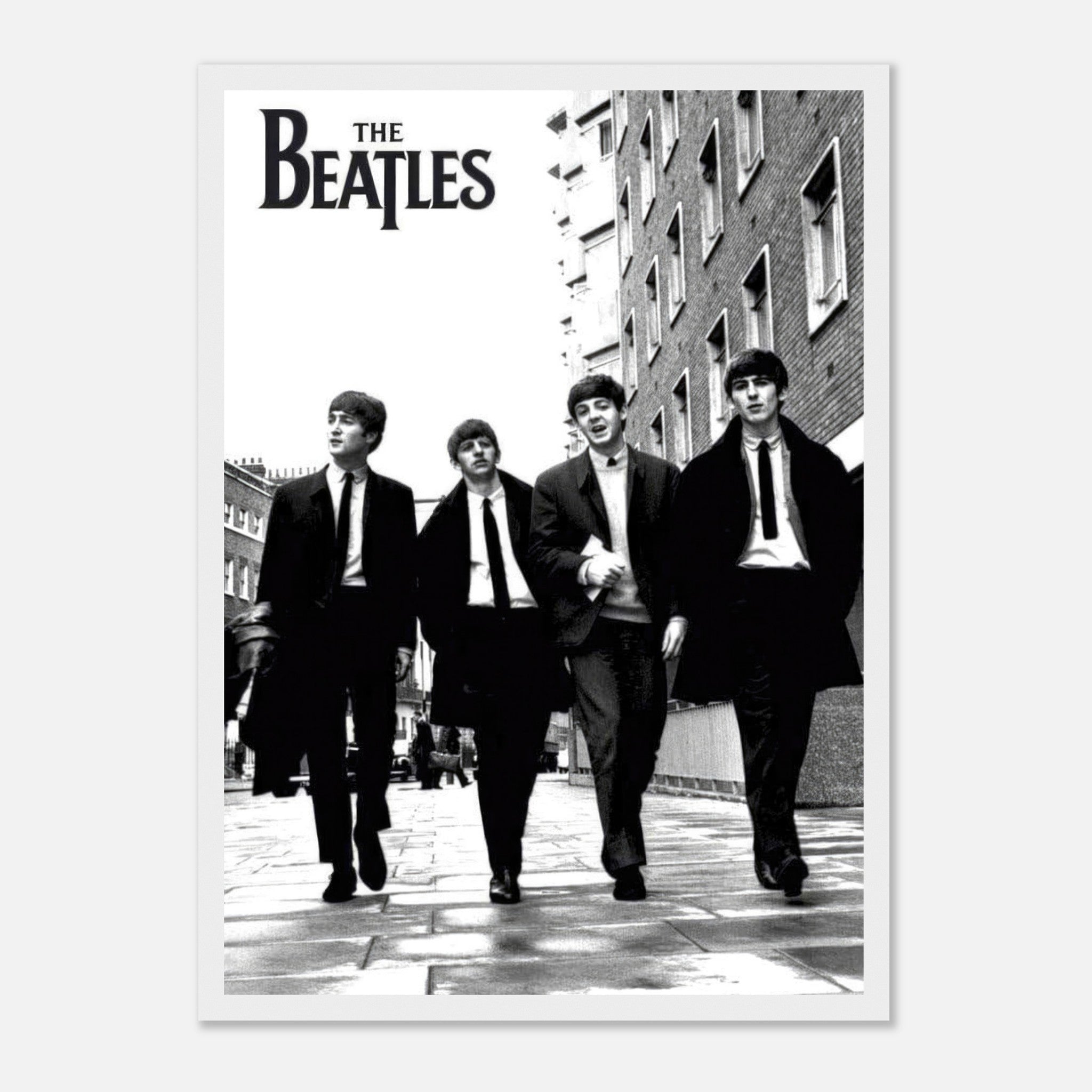 The Beatles framed print showing the iconic band walking together in black and white.
