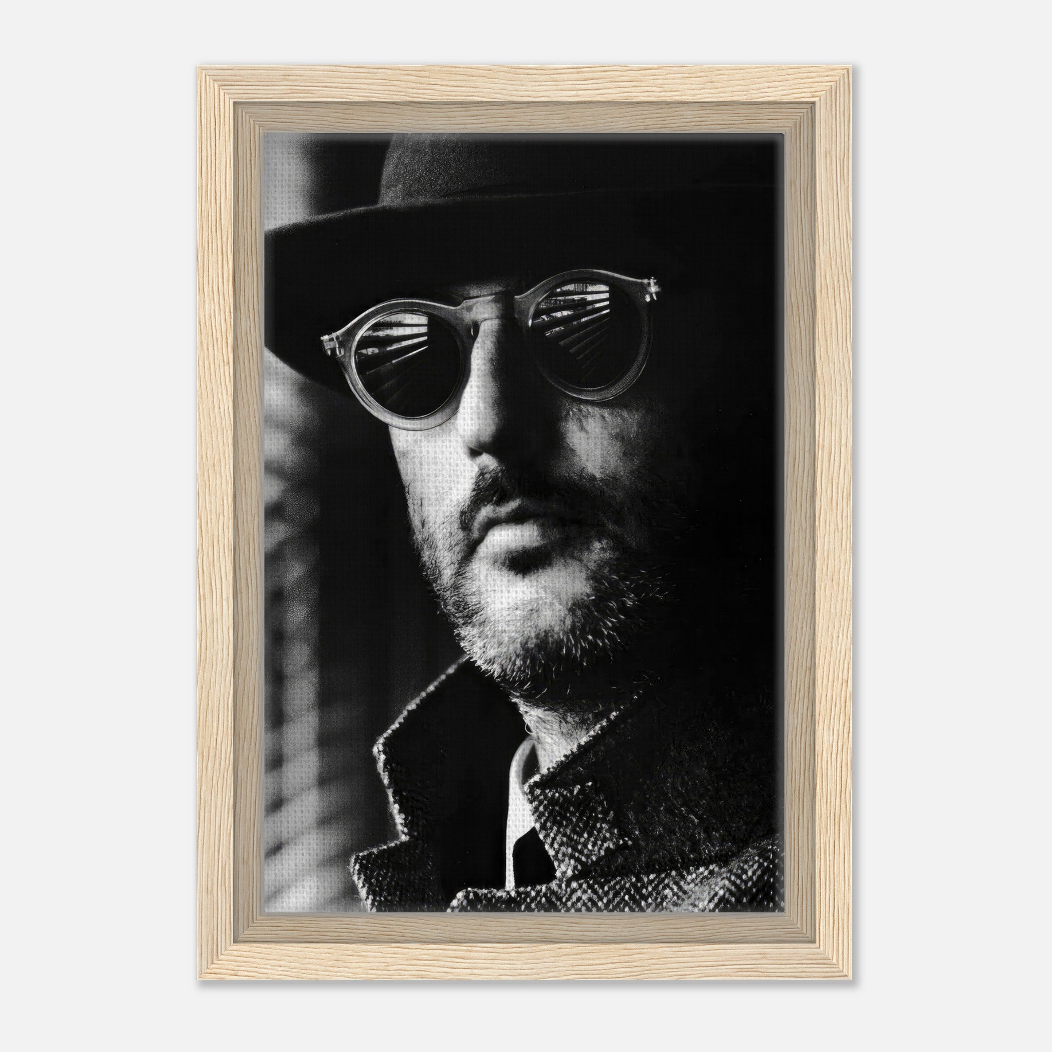 Jean Reno Leon Photography Framed Canvas Print showcasing a striking black-and-white portrait with sunglasses.
