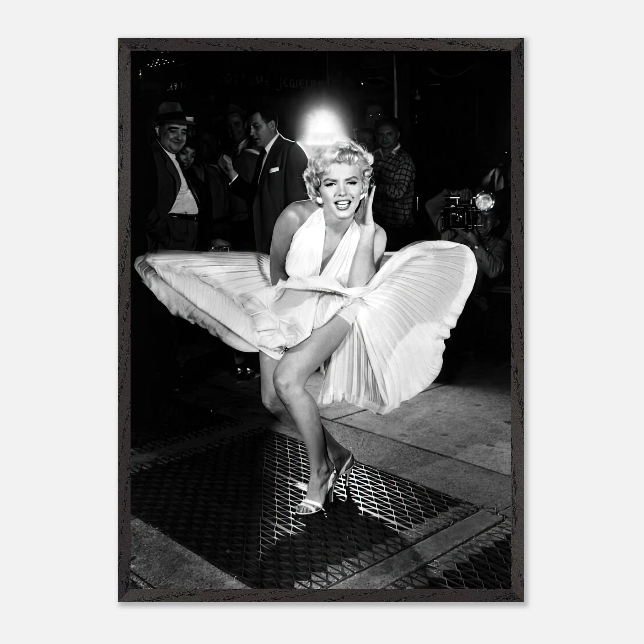 Marilyn Monroe in a white dress, playfully surprised by wind, capturing Hollywood glamour. Fine art print.
