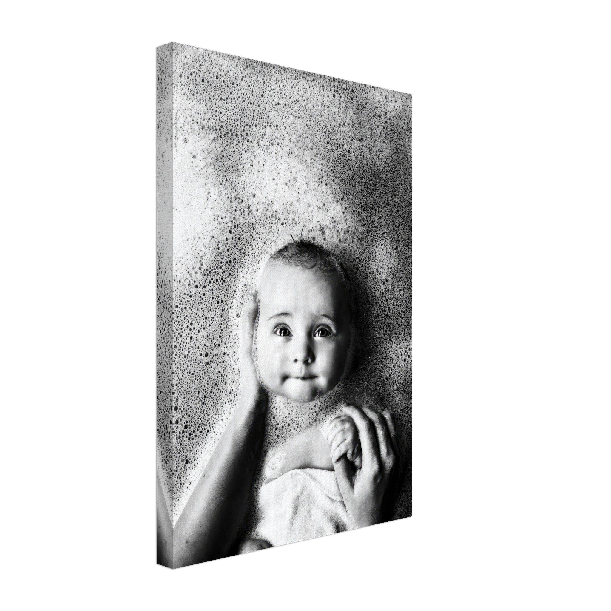 Black-and-white canvas print of a joyful baby in a bubble bath, showcasing innocence and charm.