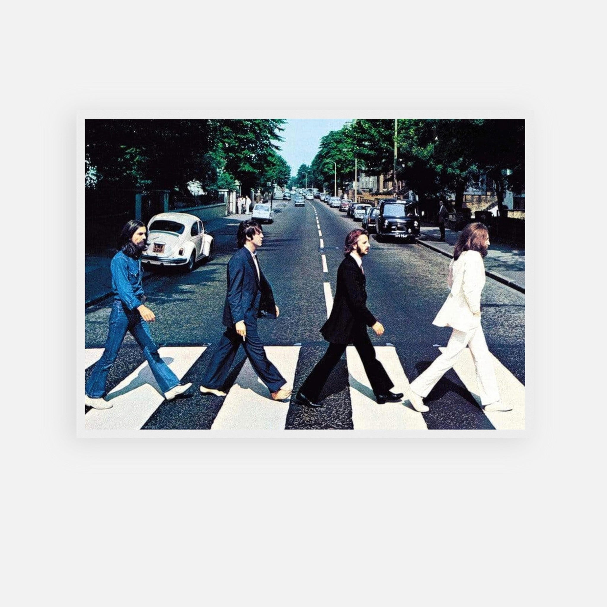 The Beatles Abbey Road framed print featuring iconic album cover with band walking across the zebra crossing.