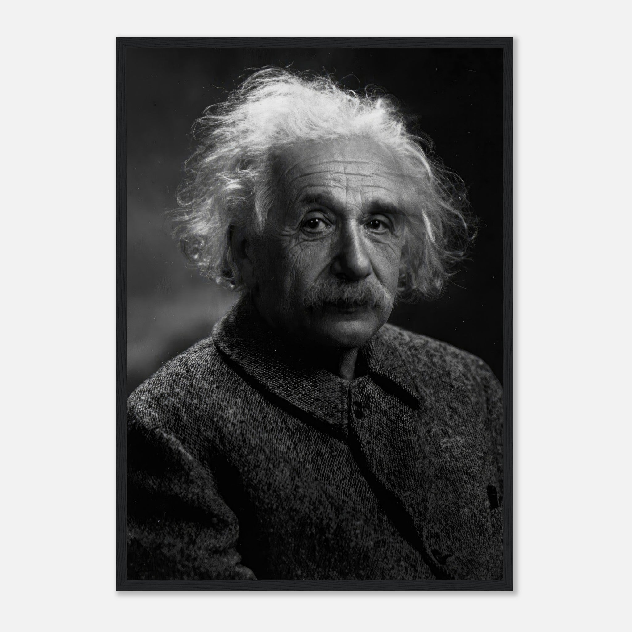 Black and white portrait of Albert Einstein, showcasing his thoughtful expression in a framed print.