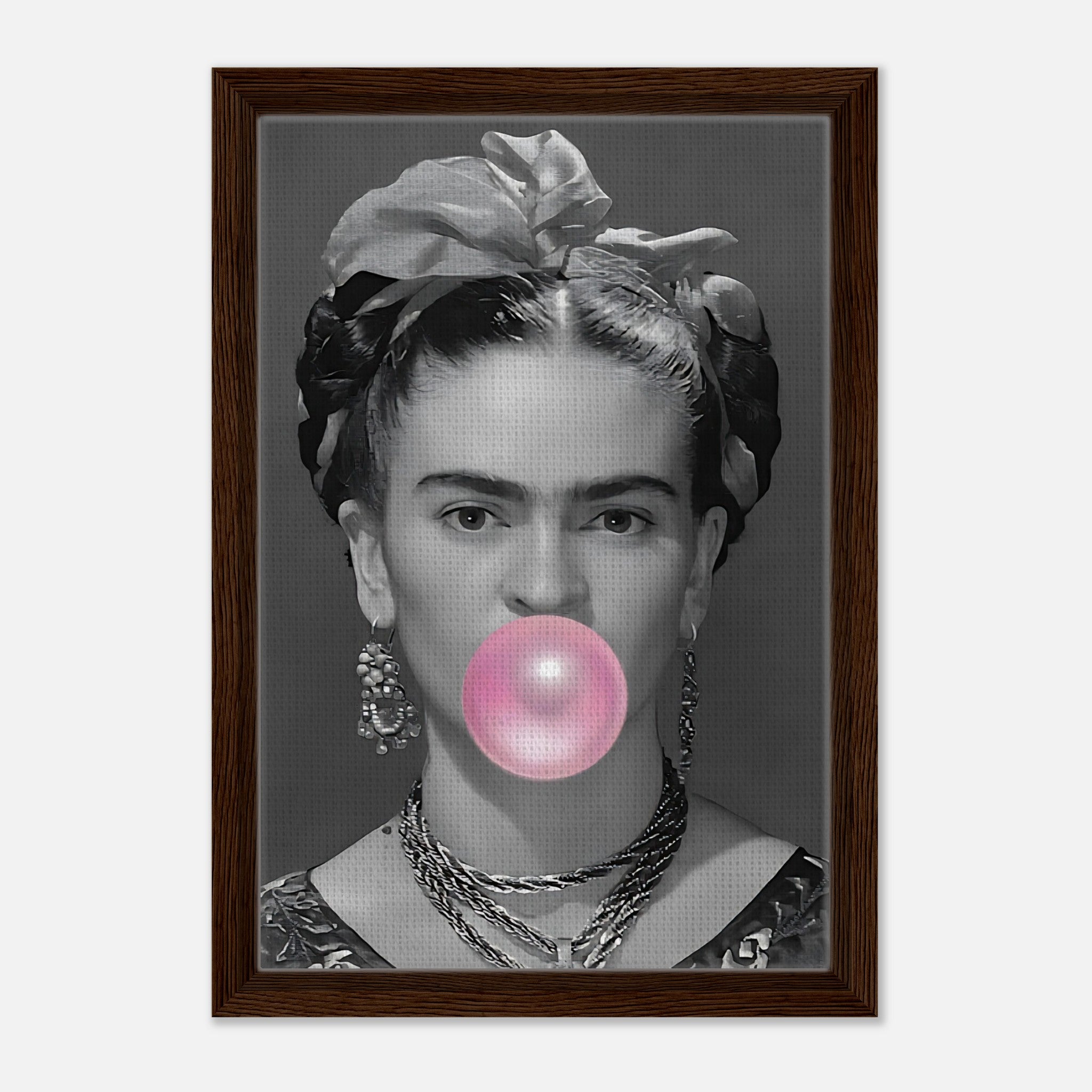 Frida Kahlo Bubble Gum framed canvas print featuring a grayscale portrait with bubble gum in a natural Wood frame.