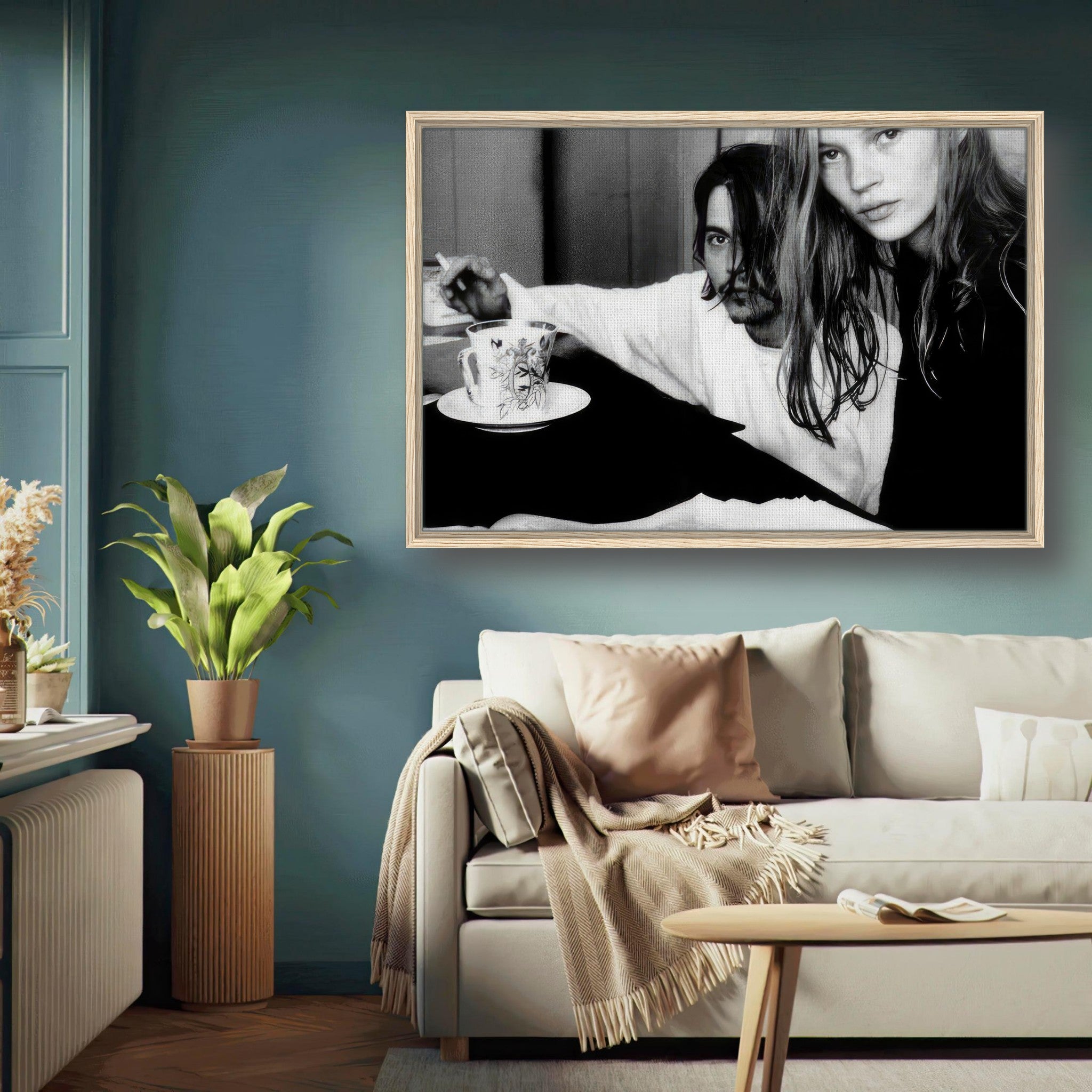 Framed black-and-white canvas print of Johnny Depp and Kate Moss, capturing 1990s celebrity romance.