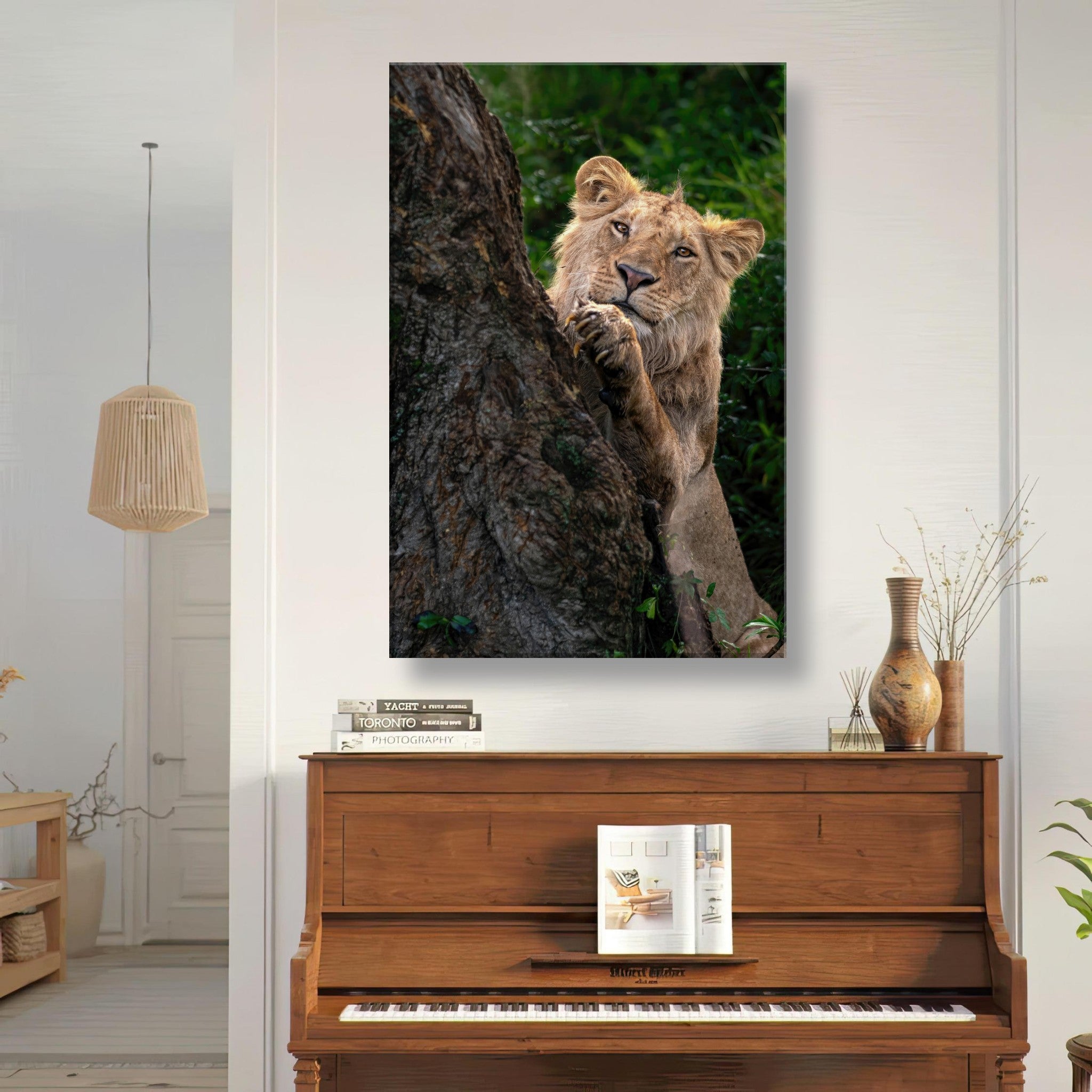 Playful lion canvas artwork showing a young lion peeking from behind a tree, vibrant greens and detailed textures.