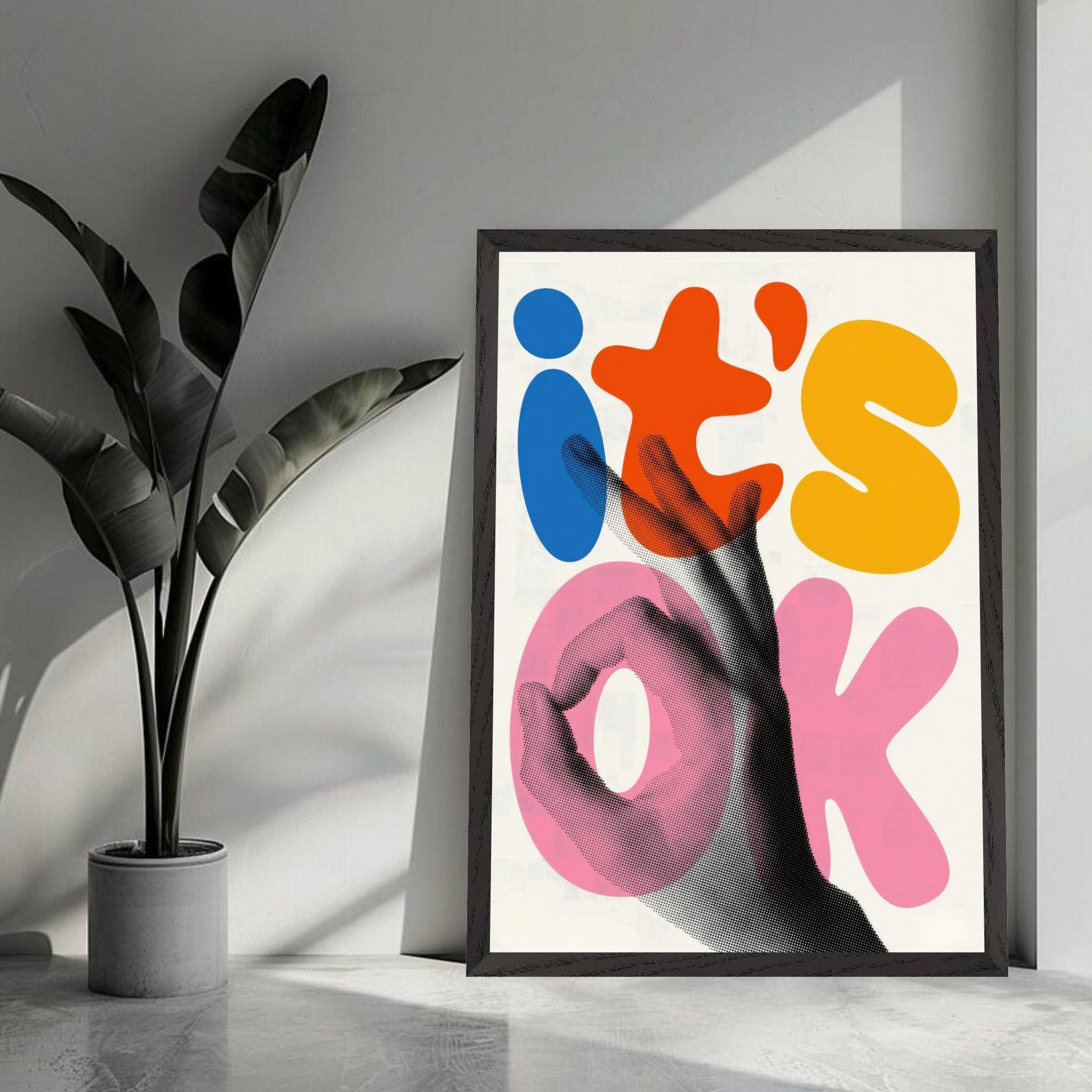 Framed retro abstract pop art featuring vibrant typography saying 'it's OK' against a textured background.