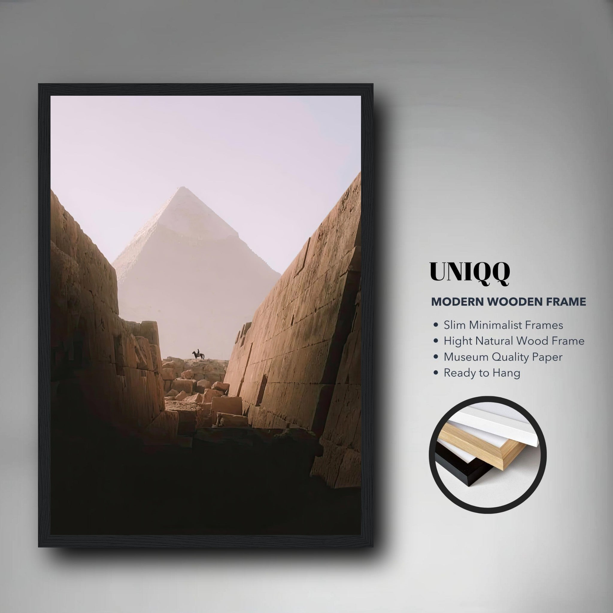 Framed print of a rider on horseback with the Great Pyramid of Giza in the backdrop, modern wooden frame design.