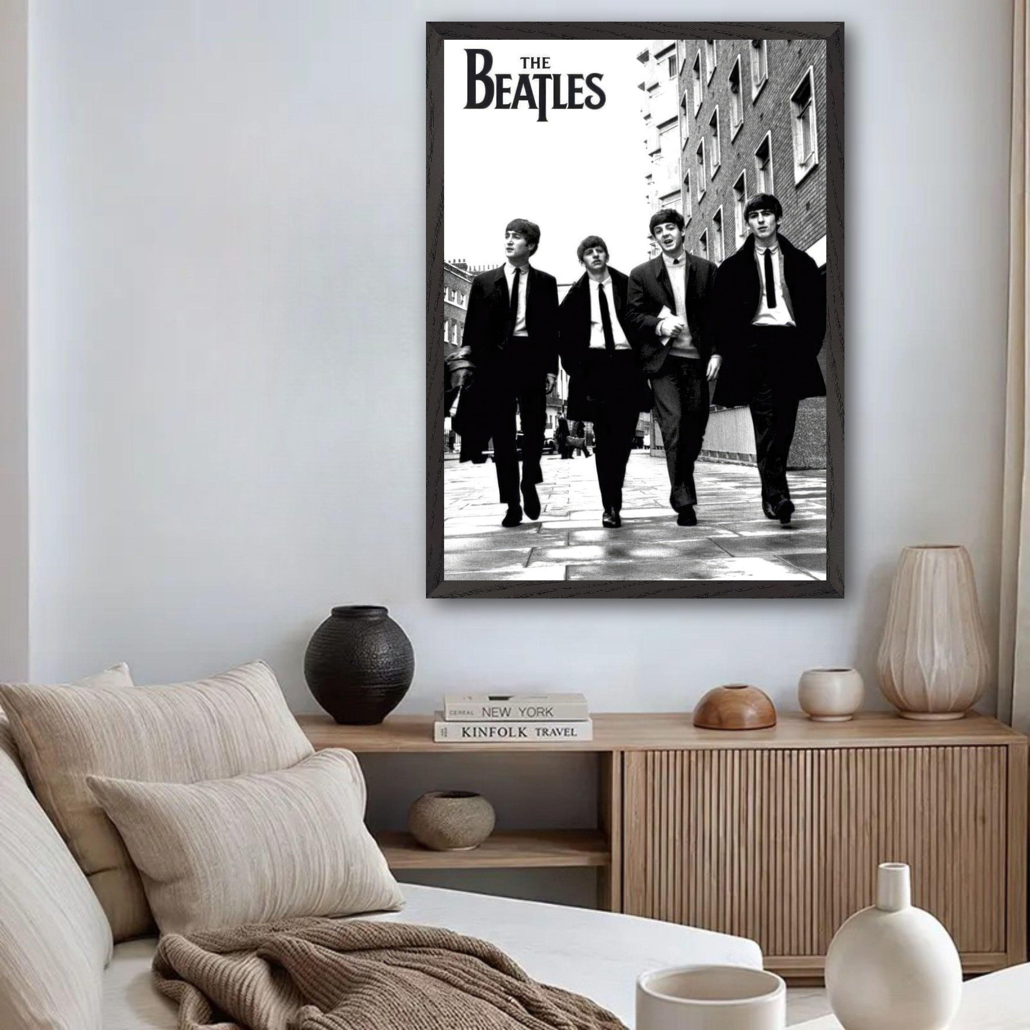 The Beatles fine art poster in museum quality, featuring iconic band members walking in a stylish black and white setting.