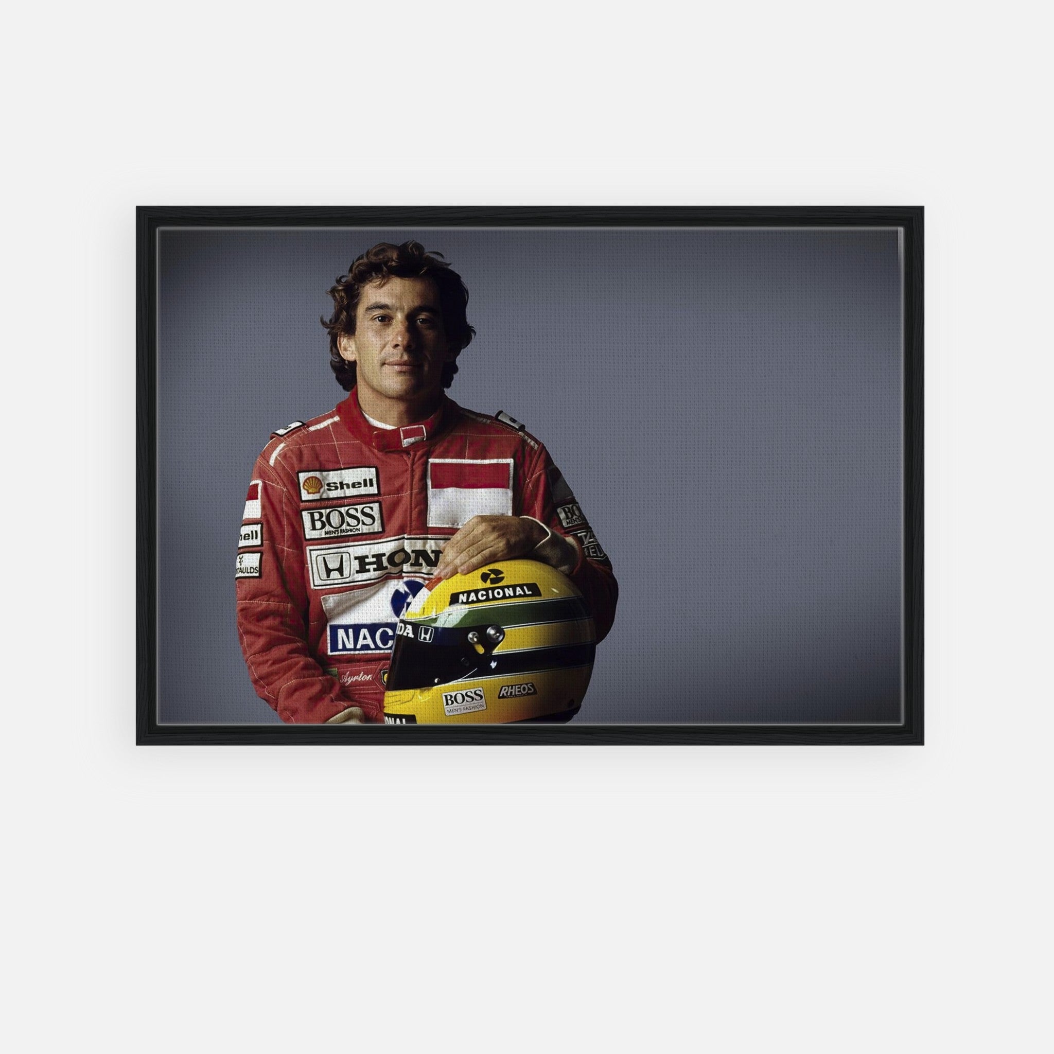 Ayrton Senna framed canvas print featuring detailed artwork of the legendary Formula 1 driver in racing gear.