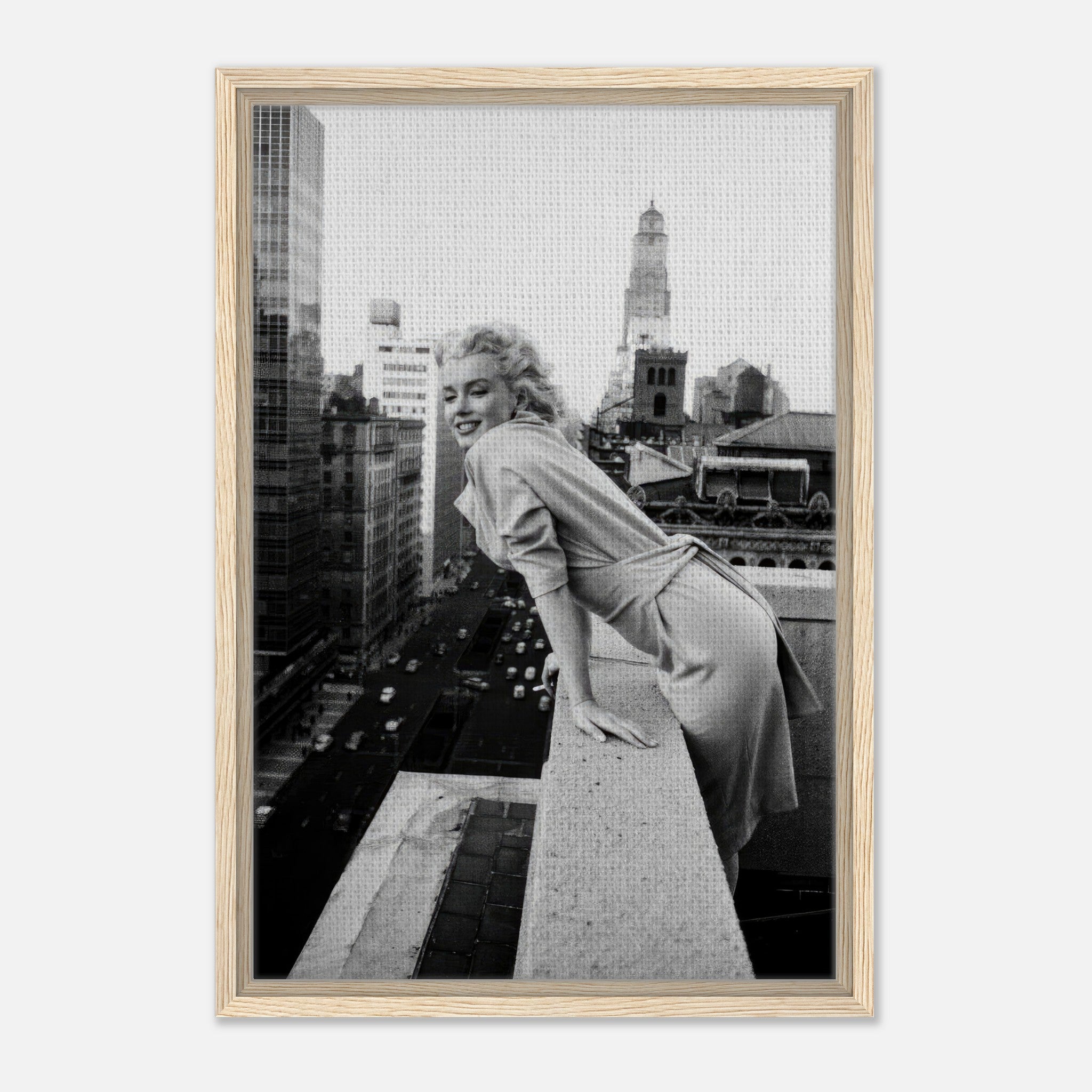 Black-and-white framed canvas of Marilyn Monroe leaning over a rooftop in New York City, showcasing timeless elegance.