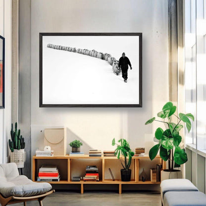 Shepherd leading a flock through snow in vintage framed art, showcasing resilience and tradition.