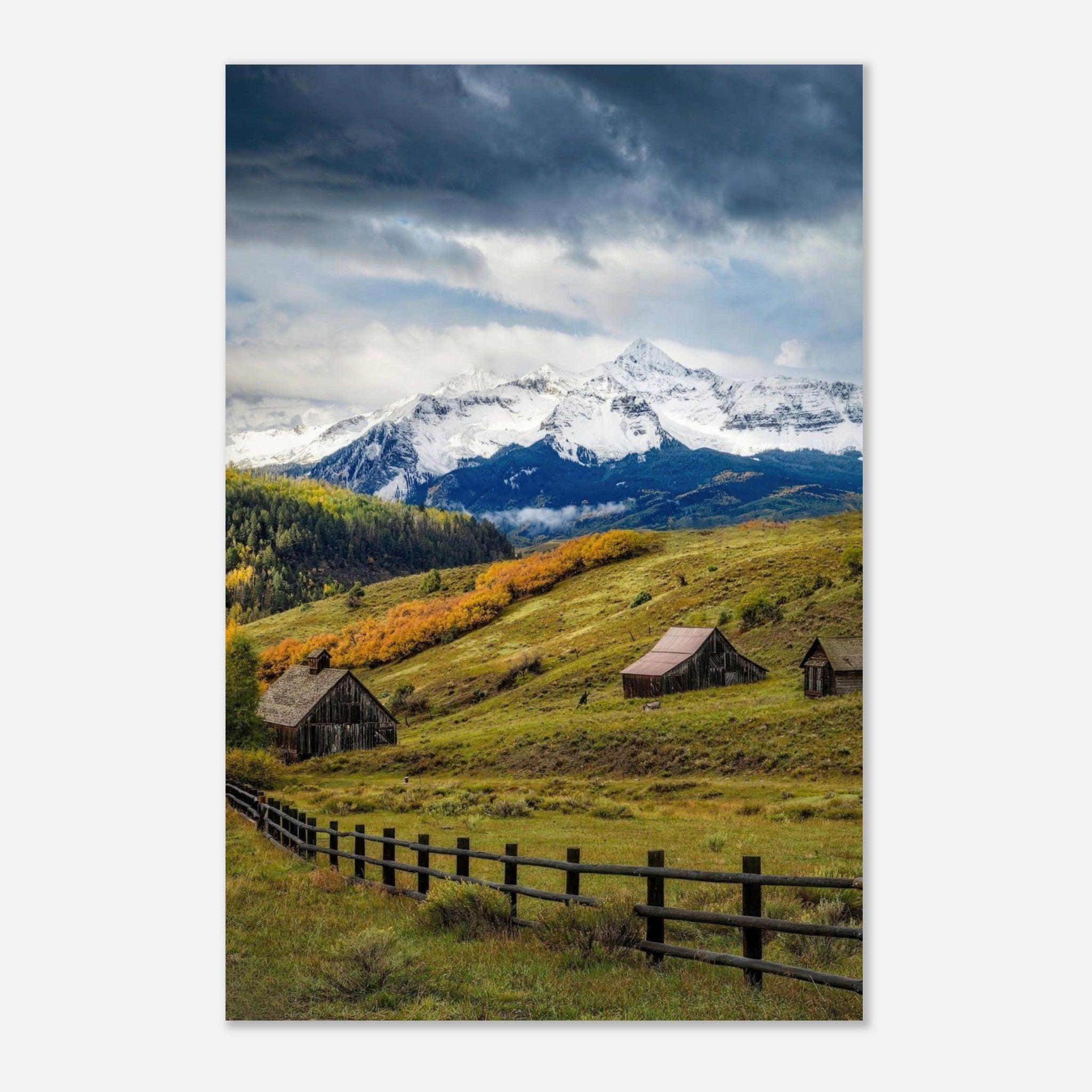 Telluride, Colorado metal print showcasing snow-capped mountains, rustic barns, and golden autumn foliage under a dramatic sky.