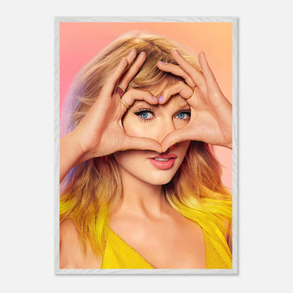 Taylor Swift vintage framed print showcasing her iconic look with heart-shaped hands and vibrant colors. Perfect for fans.