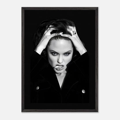 Vintage framed print of Angelina Jolie with a bold expression, showcasing Hollywood glamor in black-and-white.