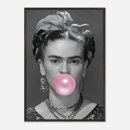 Frida Kahlo vintage framed art featuring a black-and-white photo of her blowing pink bubble gum.