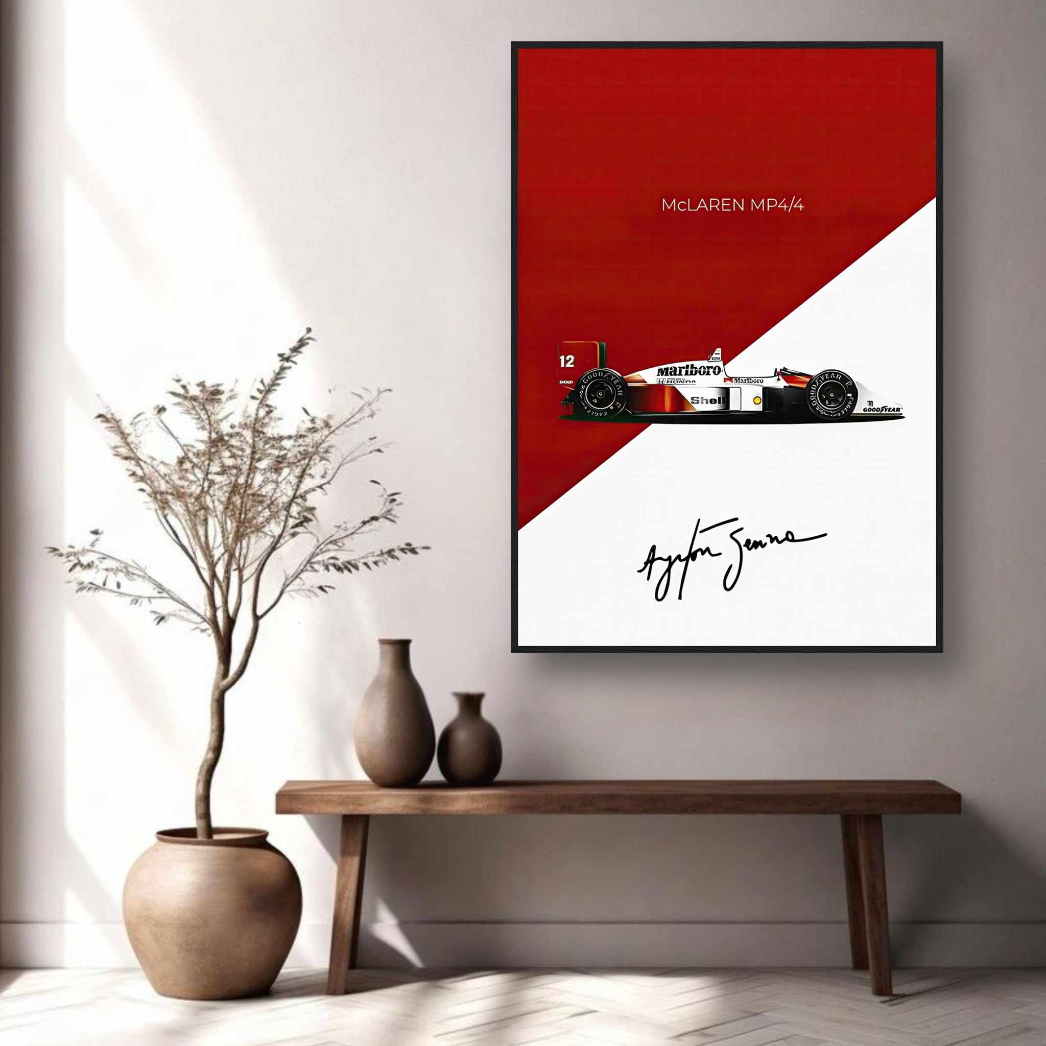 Ayrton Senna McLaren MP4/4 framed print on wall, showcasing the iconic Formula 1 car with signature and bold red design.