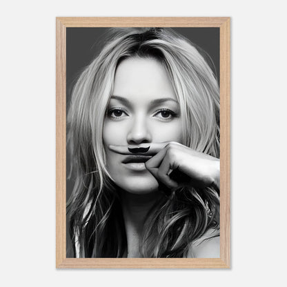 Vintage framed print of Kate Moss with a playful mustache for a trendy home decor.