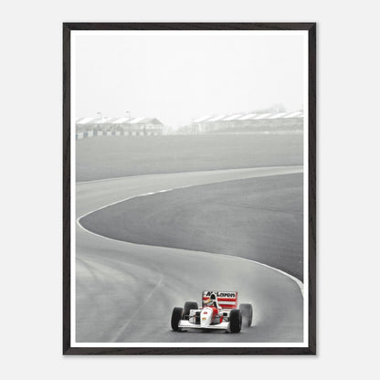 1988 Ayrton Senna McLaren MP4/4 racing on track, vintage framed photography capturing Formula 1's history.