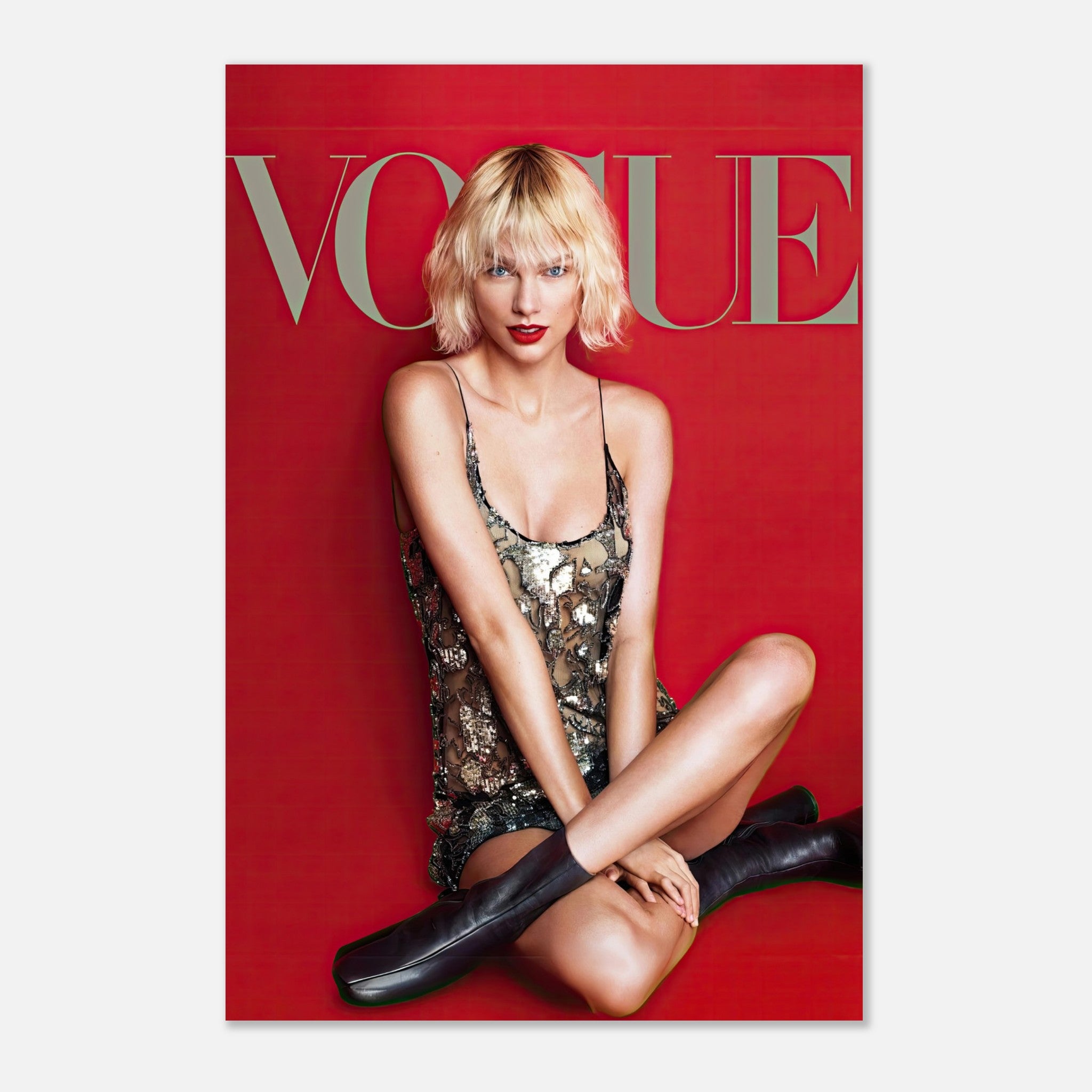 Taylor Swift Vogue metal print featuring her iconic look on a bold red backdrop, perfect for art enthusiasts.