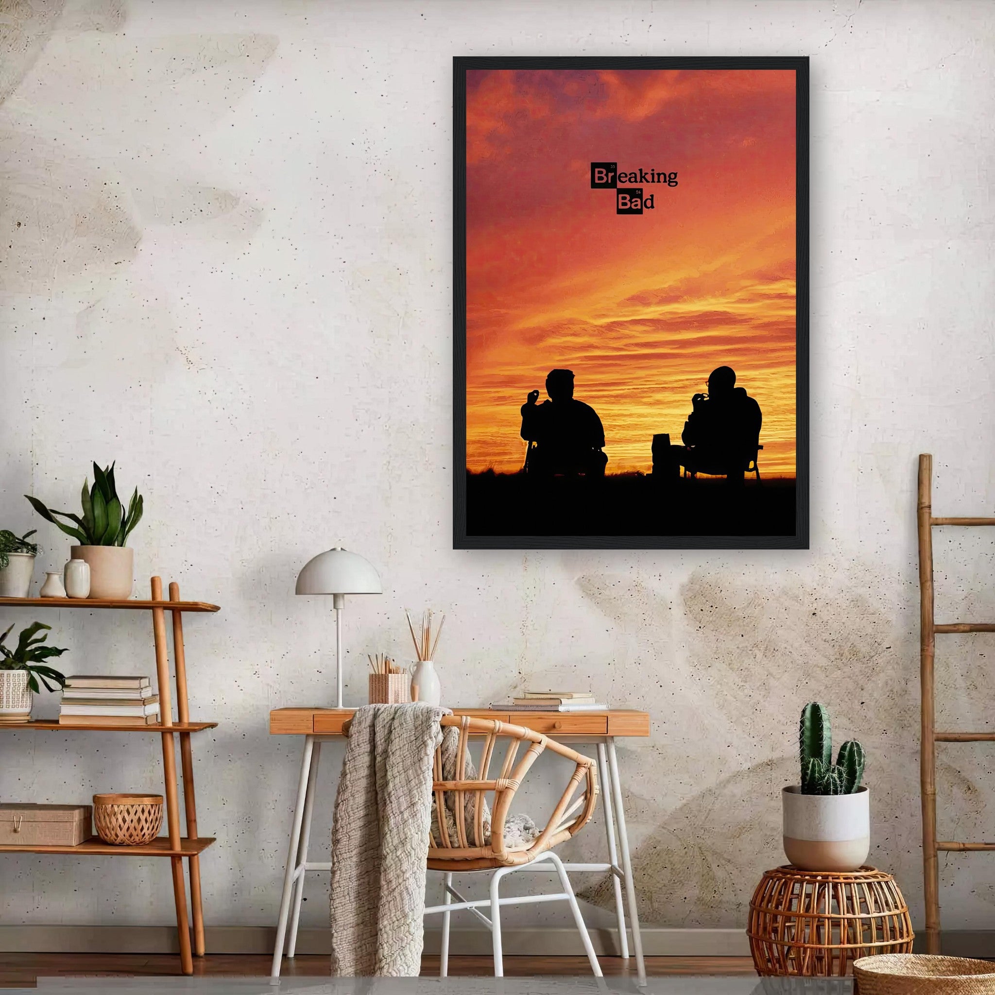 Framed Breaking Bad poster featuring Walter White and Jesse Pinkman against a vibrant sunset backdrop in a stylish room.