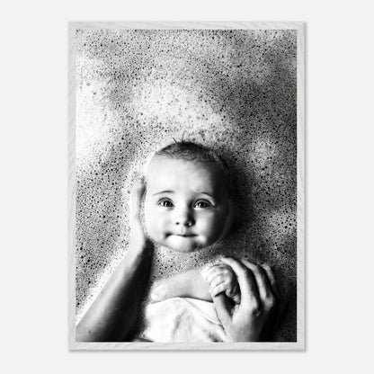 Black-and-white fine art baby bath photography capturing innocence and joy with soft bubbles and tender emotion.