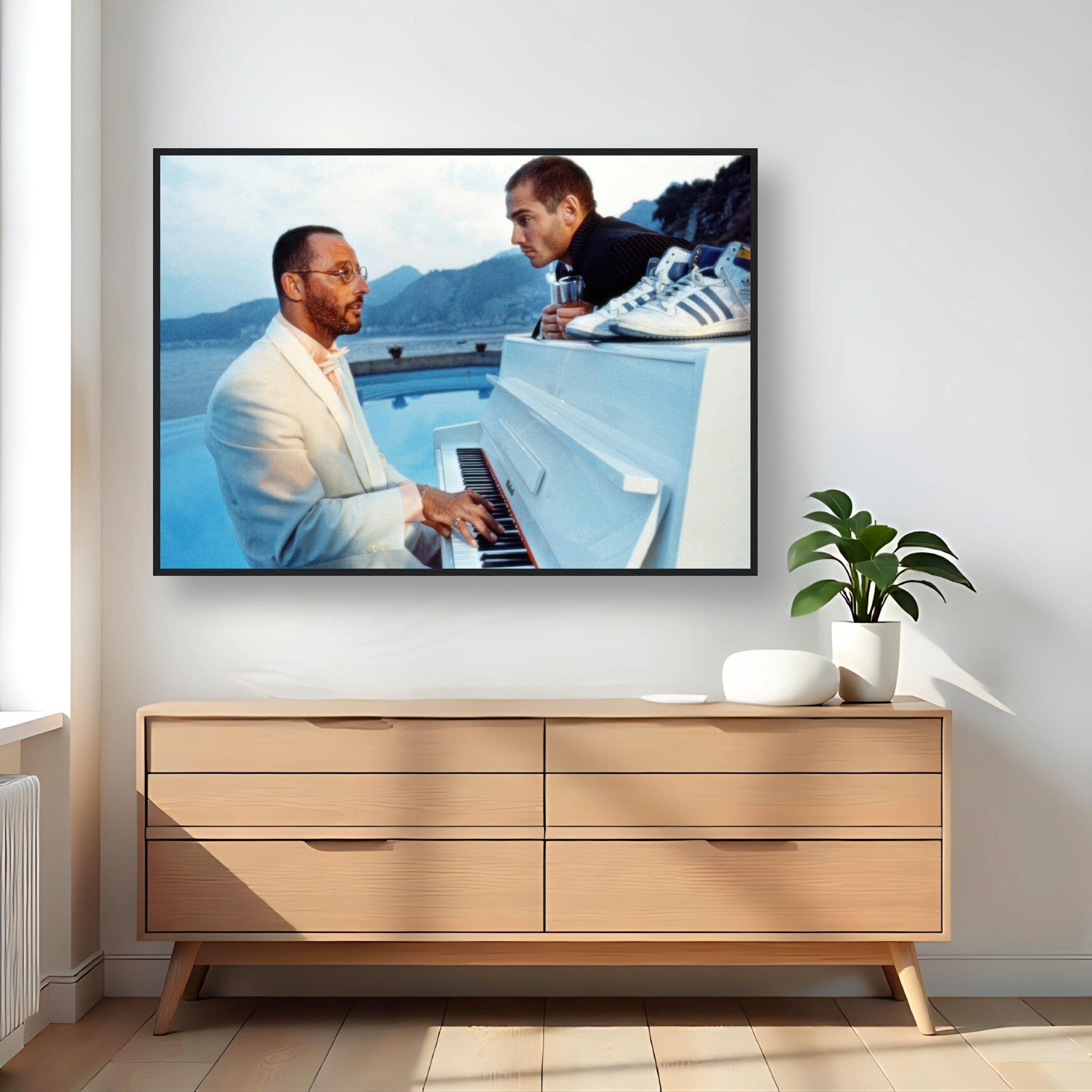 Jean Reno at piano in iconic scene from "The Big Blue," framed print adding cinematic charm to any room.