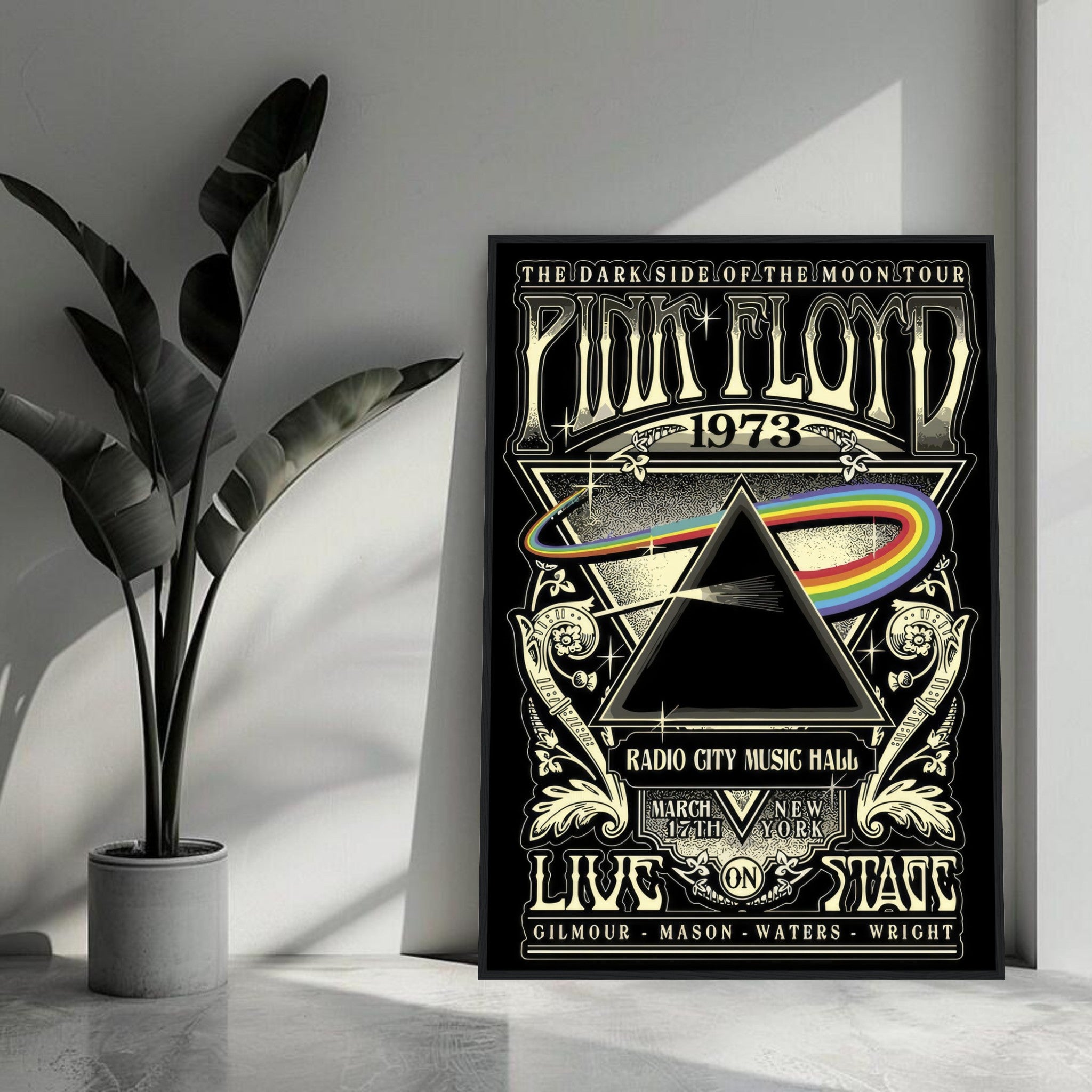 Framed print of Pink Floyd's "The Dark Side of the Moon" tour poster from 1973, featuring iconic prism design.