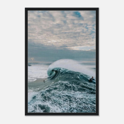 Framed canvas print of a surfer riding a massive wave, capturing the essence of big wave surfing.