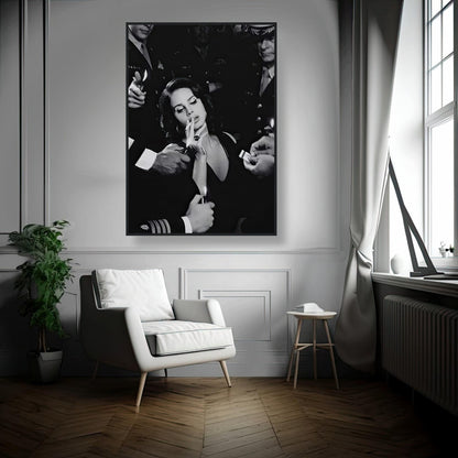 Framed print of a woman smoking, surrounded by admirers, showcasing vintage Hollywood glam in a modern interior.