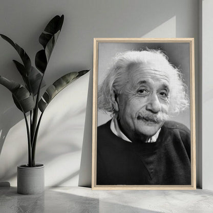 Framed black and white portrait of Albert Einstein in 1946, showcasing his wise expression and timeless charm.